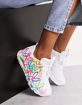 Skechers Uno sneakers with neon graffiti heart print in white | ASOS (Global)