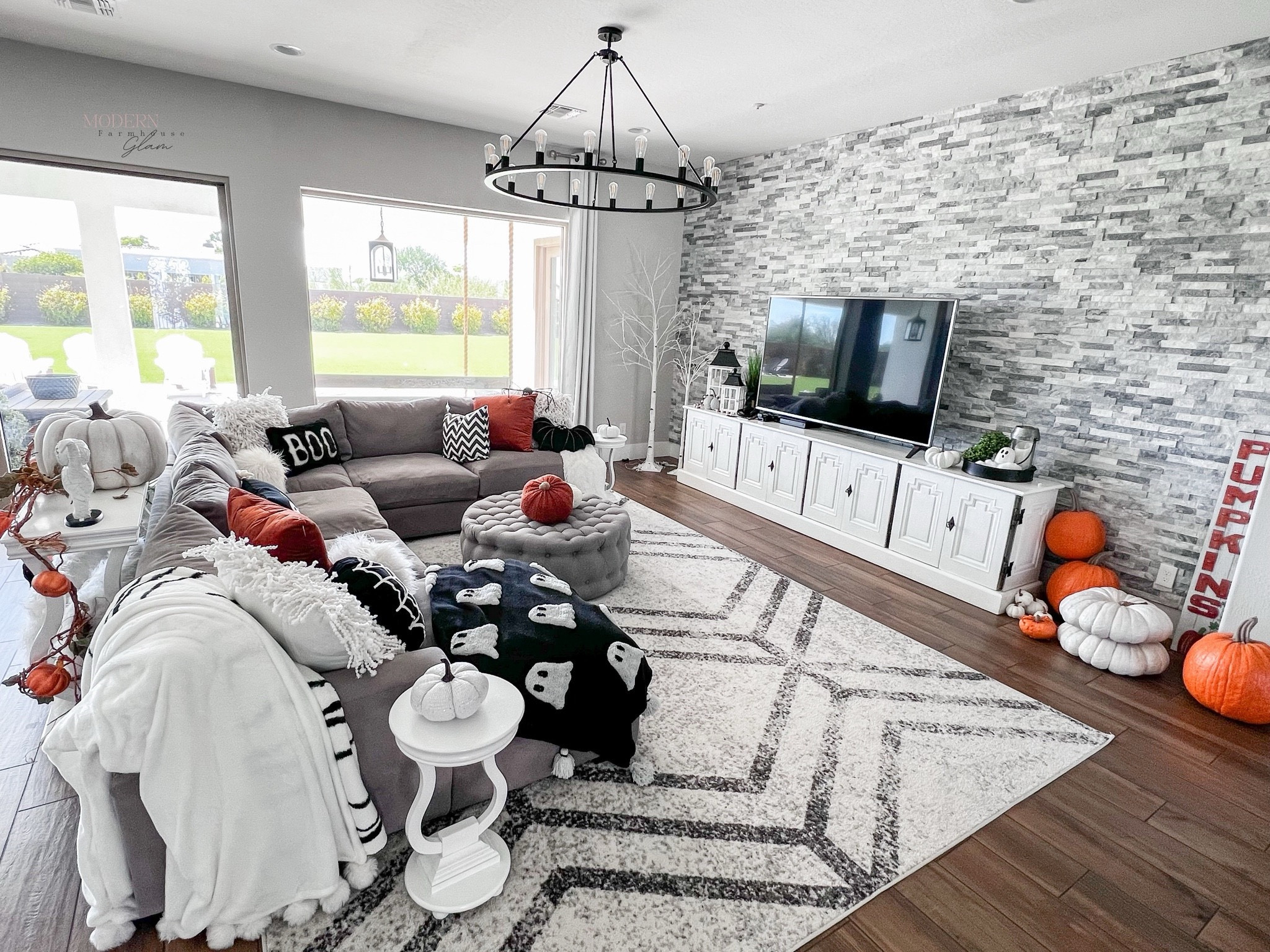 Fall and Halloween family room home decor at Modern Farmhouse Glam

Grey sectional couch tufted ottoman media console tables neutral area rug lighting livingroom familyroom home decor furniture

#LTKHome #LTKSeasonal