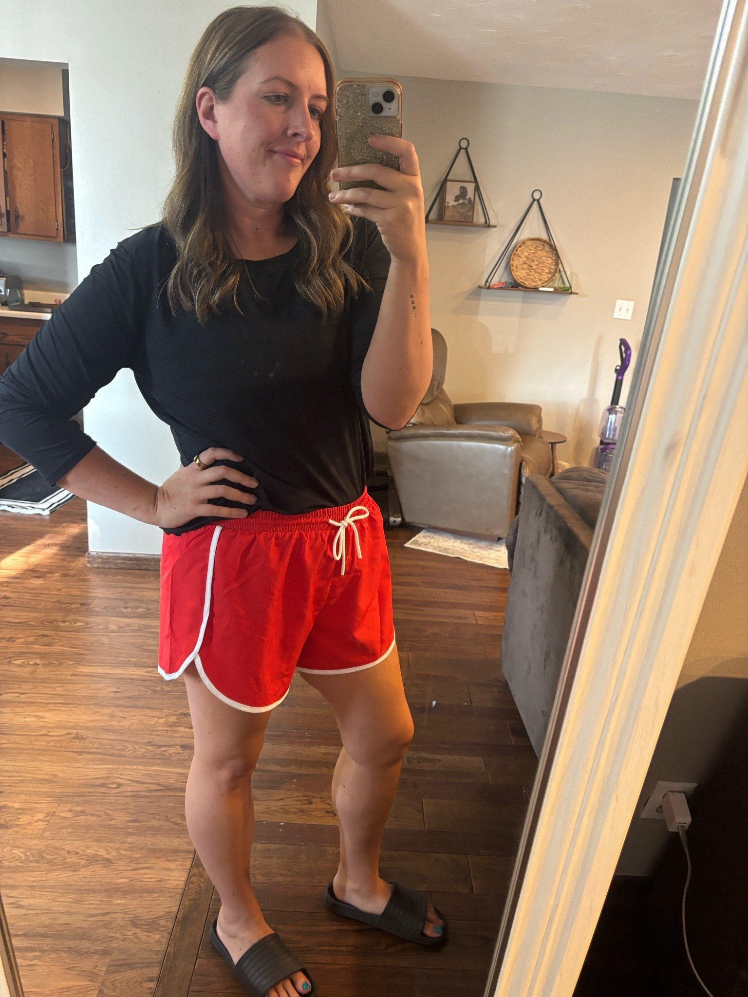 Black + red = always a vibe 🖤❤️ Keeping it casual with these sporty red shorts, a simple black top, and slides. Easy summer outfit, zero fuss. ✨

#LTKActive #LTKfitnessgoals