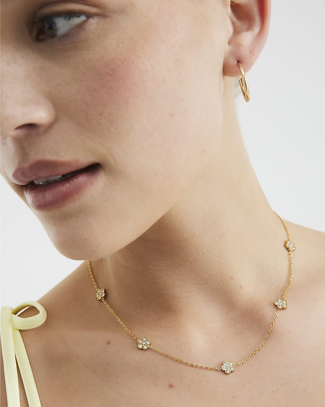 Gold Stainless Steel Diamante Flower Necklace | River Island UK & IE