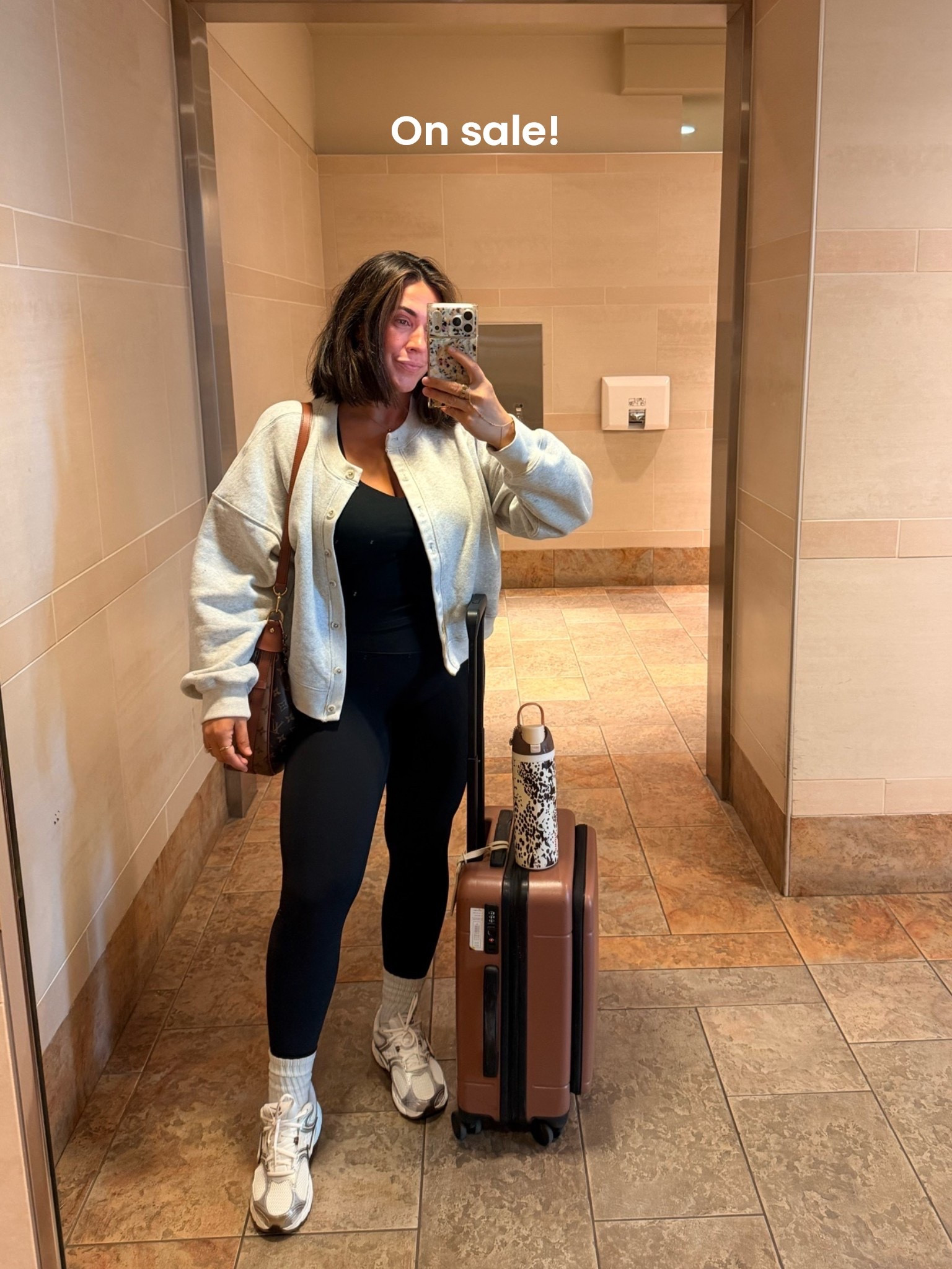 Use code AFXLTK! The best cardigan sweatshirt. Casual fall travel outfit, leggings of course! Size L in all :) my tank has a built in bra so no bra on flight for me. Shoes are 12/10 comfy.