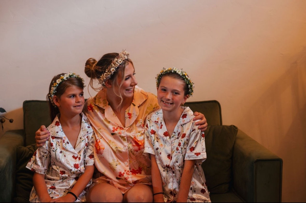 Wedding day of getting ready with bride 
Flower girls satin floral pajama set 