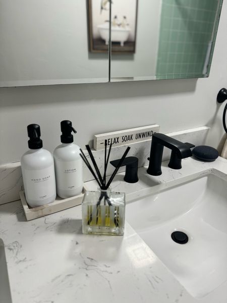 Bathroom soap and lotion dispenser. Black and white bathroom. Nest oil diffuser. Amazon finds.

#LTKU #LTKhome #LTKfindsunder50