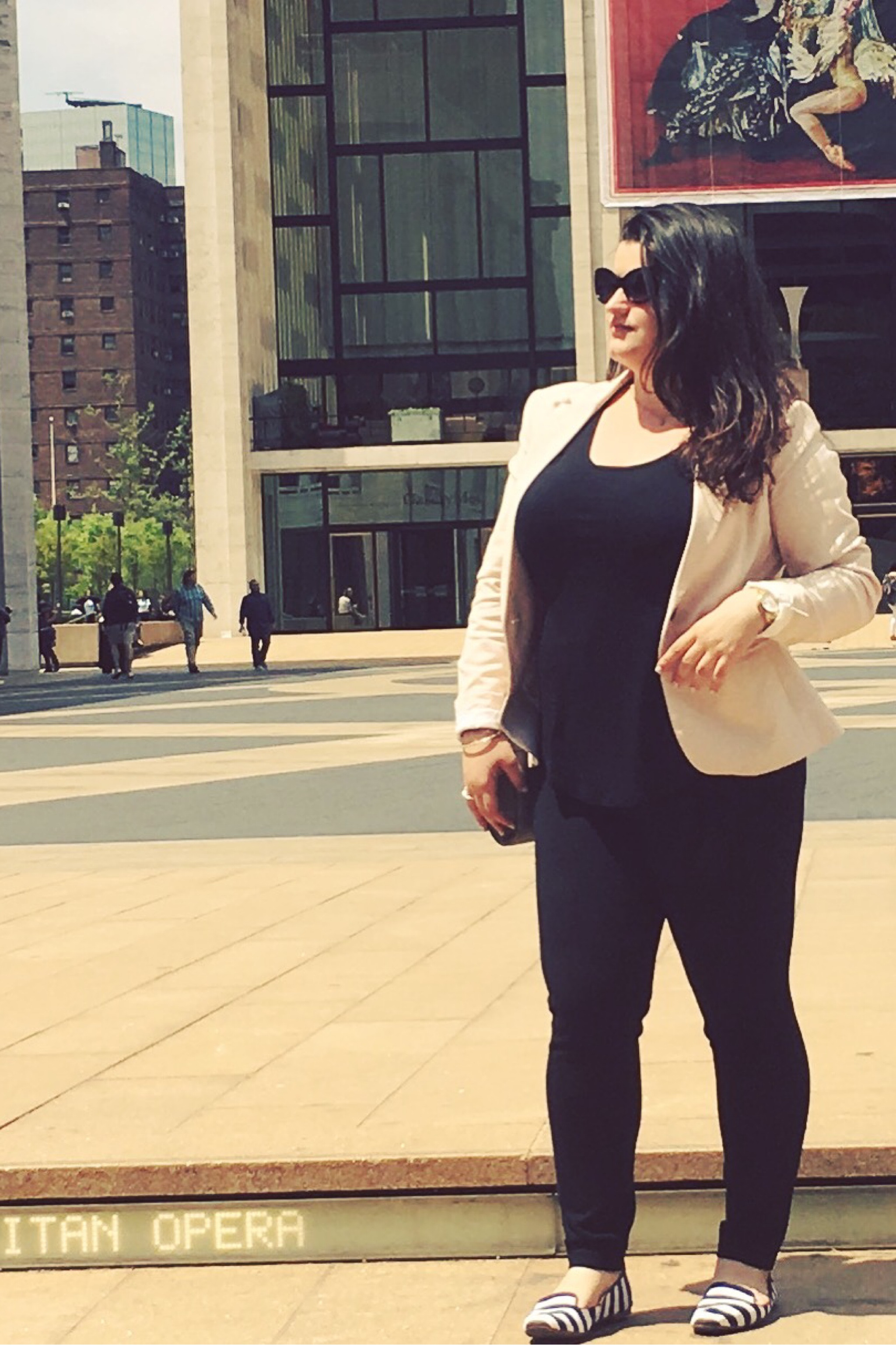 Celebration women equality today! Here is a power pose and a power outfit. This is great for work, school, as a yea her, or to go out. Beige blazer paired with a black top, cat eye sunglasses, black skinny pants, small crossbody bag, and striped flats/loafers 

#LTKworkwear #LTKmidsize #LTKBacktoSchool