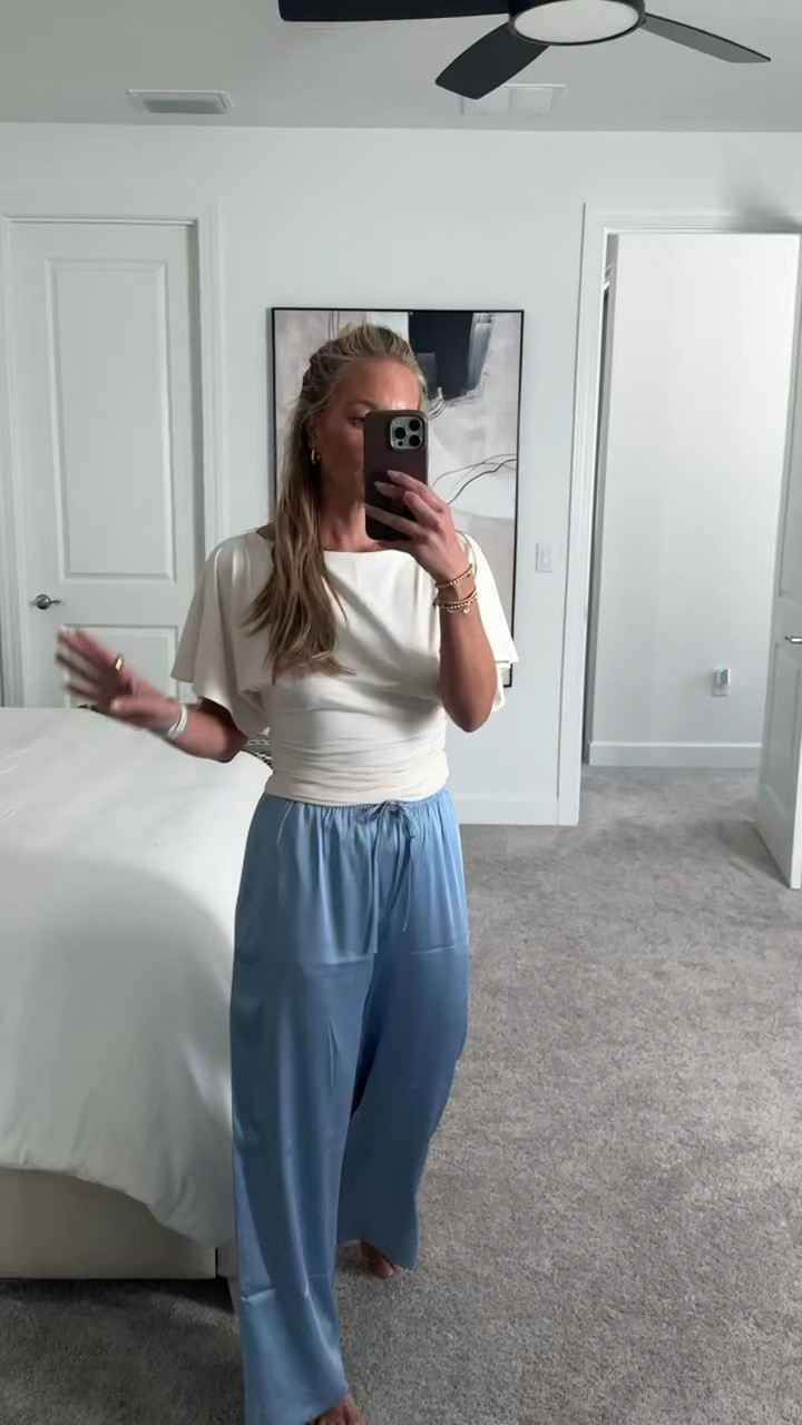 The @abercrombie  satin pants are a staple piece. I'm loving them in this light blue for Spring/Summer, they're so versatile you could dress them up for a date night outfit or wear with flip flops and a tank for a more casual vibe.

They sold out instantly during the holiday season. Paired it with this gorgeous flowy sleeved top. Wearing a S in both.

Abercrombie satin pants, satin pull on pants,
Abercrombie spring finds, Abercrombie new arrivals

#LTKSeasonal #LTKootd