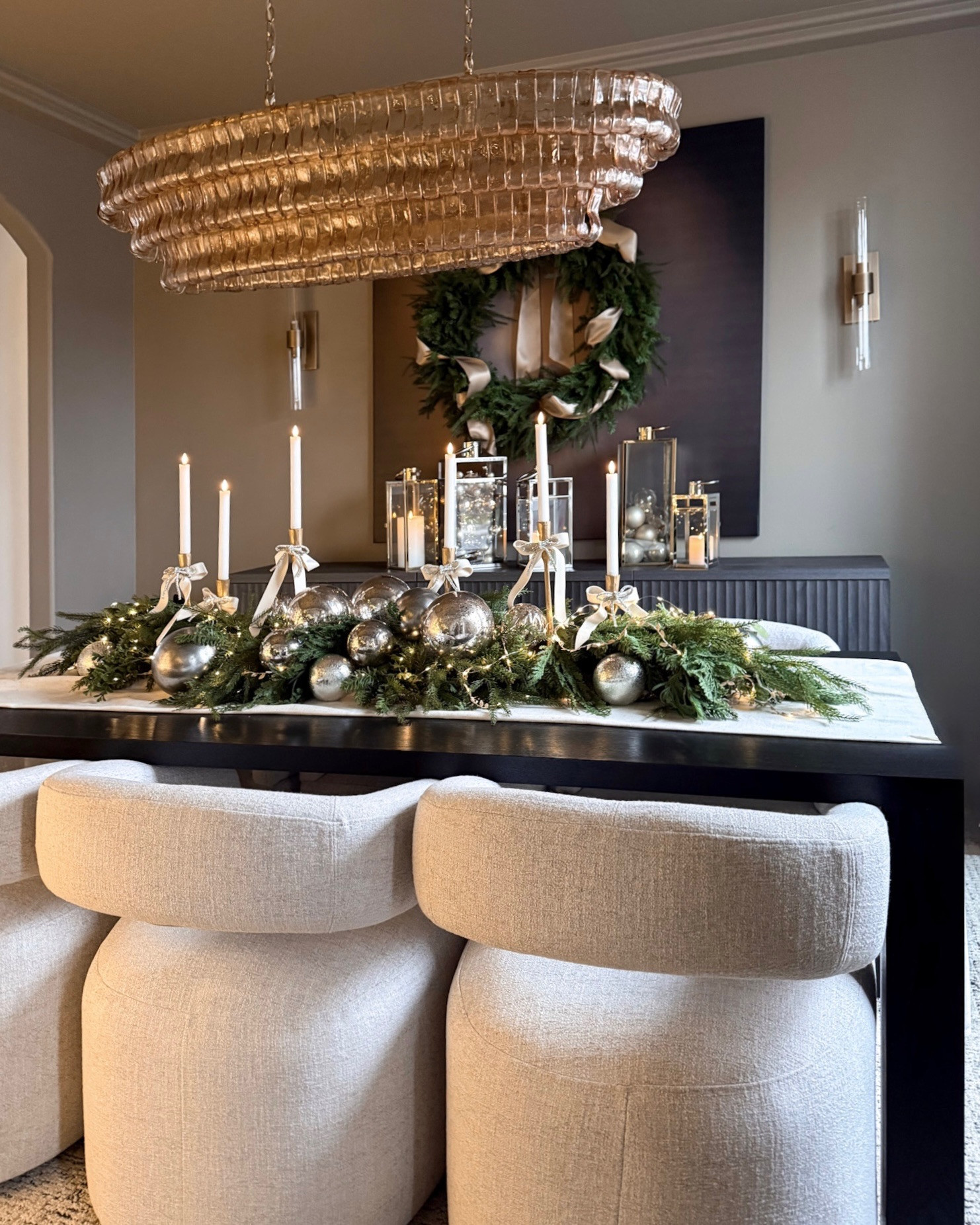 ELEGANT HOLIDAY TABLESCAPE! This is the centerpiece that makes the whole season feel magical. Layered greenery, mixed metallic ornaments, and soft candlelight create an elevated, Restoration-inspired dining moment. It’s simple, timeless, and the perfect way to make your holiday gatherings feel warm and special.

#Amazon #TheHillaryStyle #HolidayHome #TablescapeInspo #ChristmasDecor #ElegantHoliday #NeutralHolidayDecor #DesignerLookForLess #FestiveDining #HomeStyle 

 #LTKHoliday #LTKSeasonal #LTKOver40