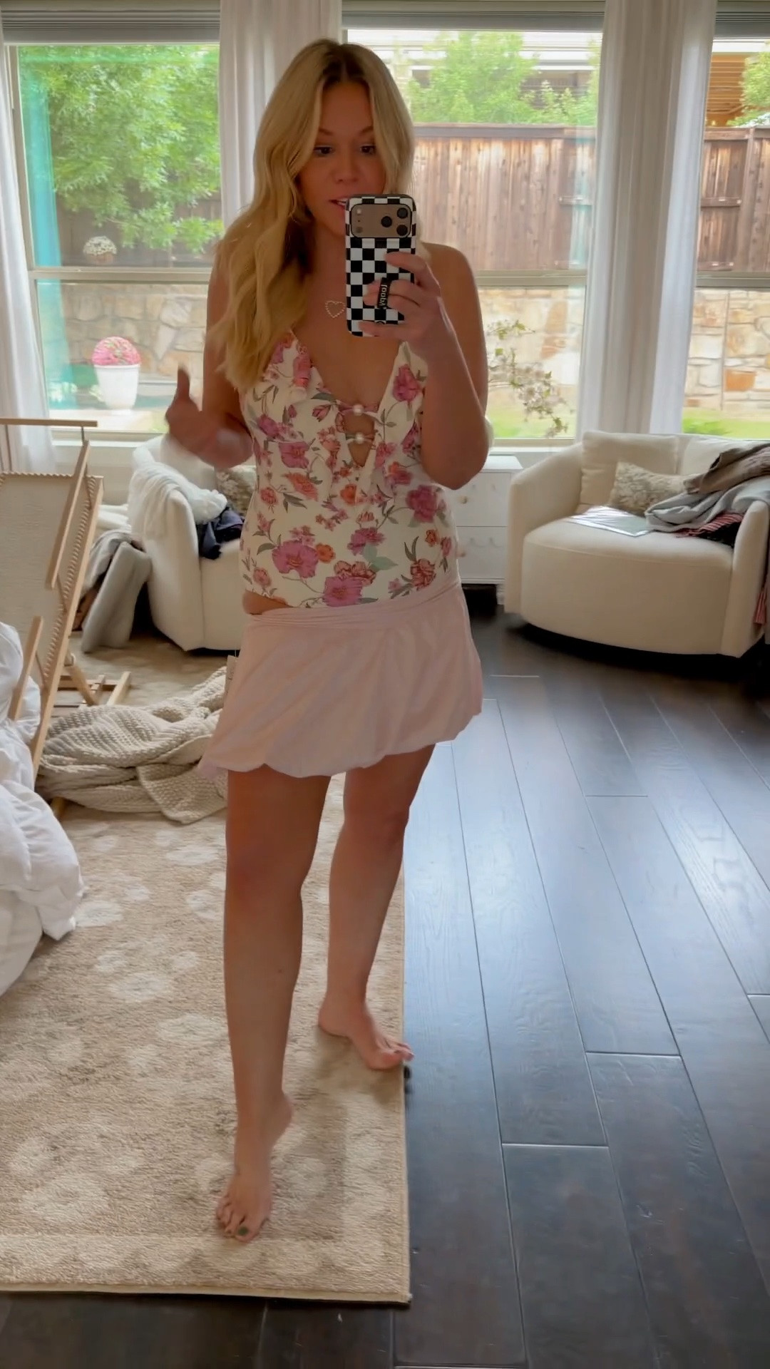 Cutest swimsuit ever!! it is true to size I’m wearing my normal medium, and I sized up to a large in this bubble skirt