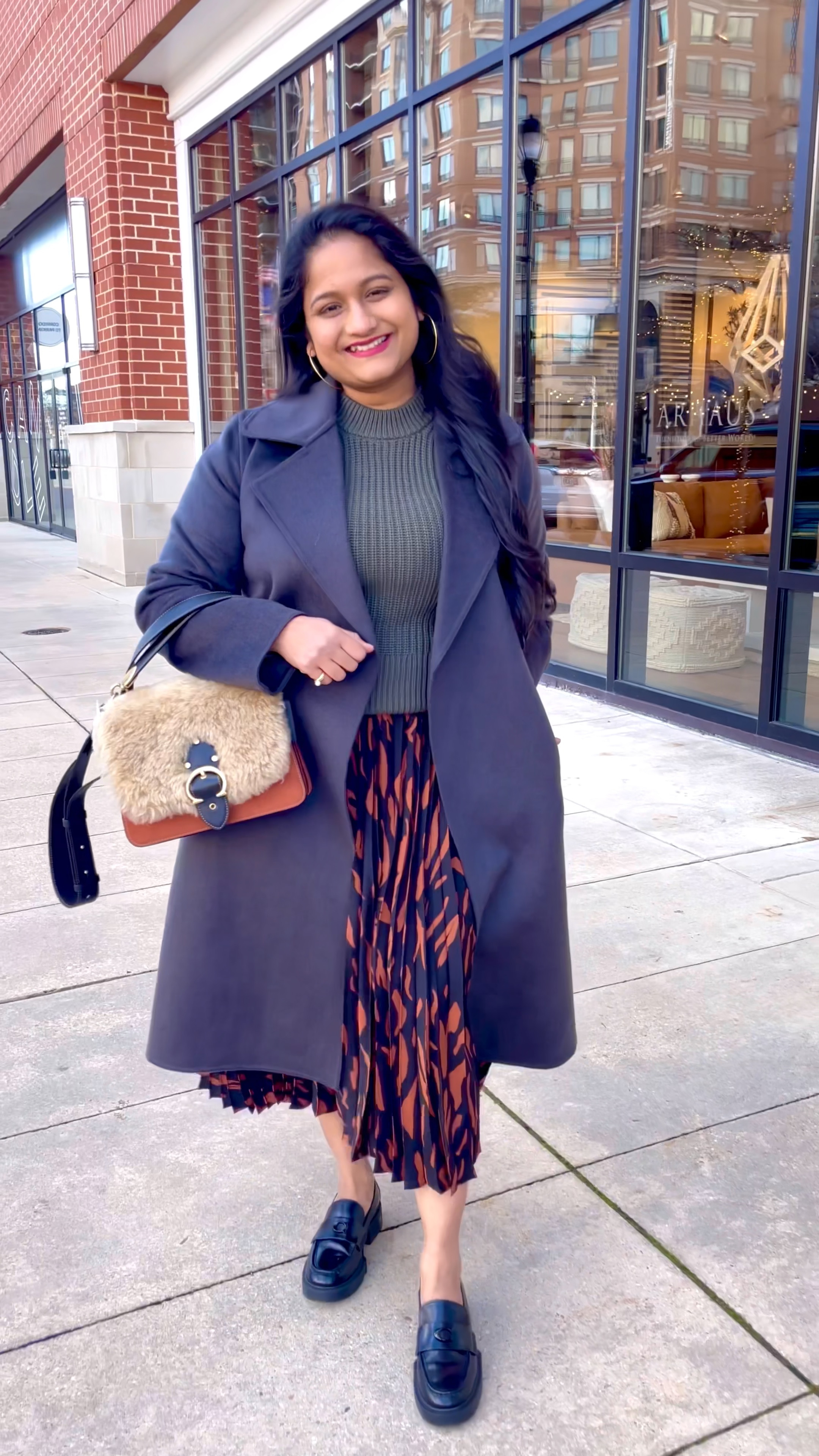 Spring work outfit, spring outfit ideas. 
@Everlane sweater in size S (fits TTS)
@mango printed pleated skirt in size M 
@uniqlo wrap coat in size S (fits loose)

#LTKstyletip #LTKcurves #LTKSeasonal