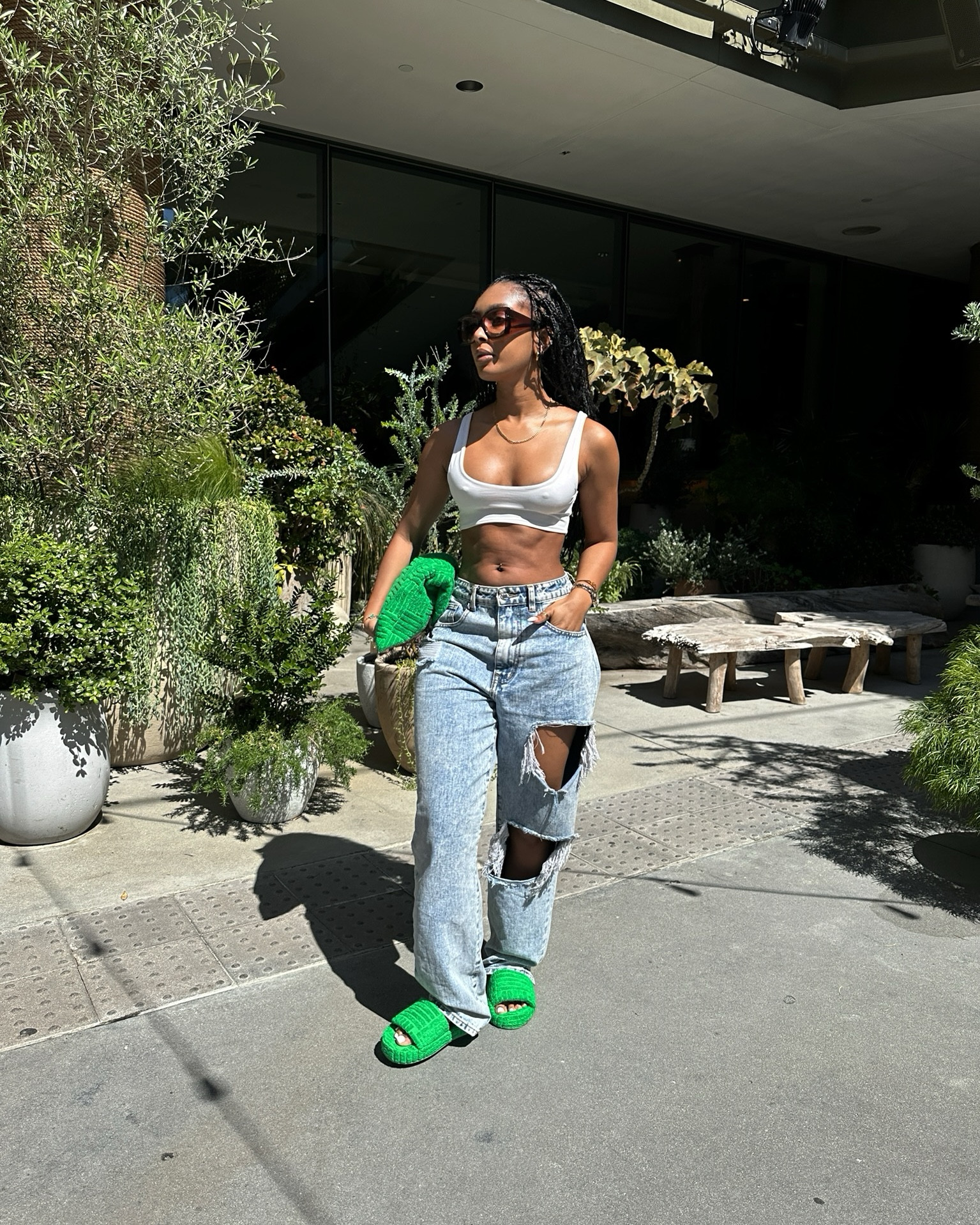 Casual outfit, baggy jeans, street style, bottega veneta green pouch bag and sliders, towelling sliders, summer outfit, LA outfit, baggy fit 

#LTKSeasonal #LTKfamily #LTKstyletip