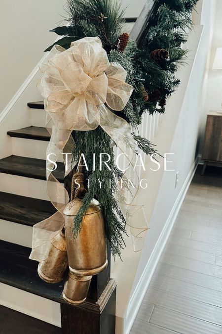 Using my favorite garlands and accessories for this simple yet chic staircase look!  Shop links below ✨



#christmasdecor #garland #norfolkgarland #realtouchgarland #bells #christmasbells #goldbells #staircasestyling #holidaydecor

#LTKhome #LTKHoliday #LTKSeasonal