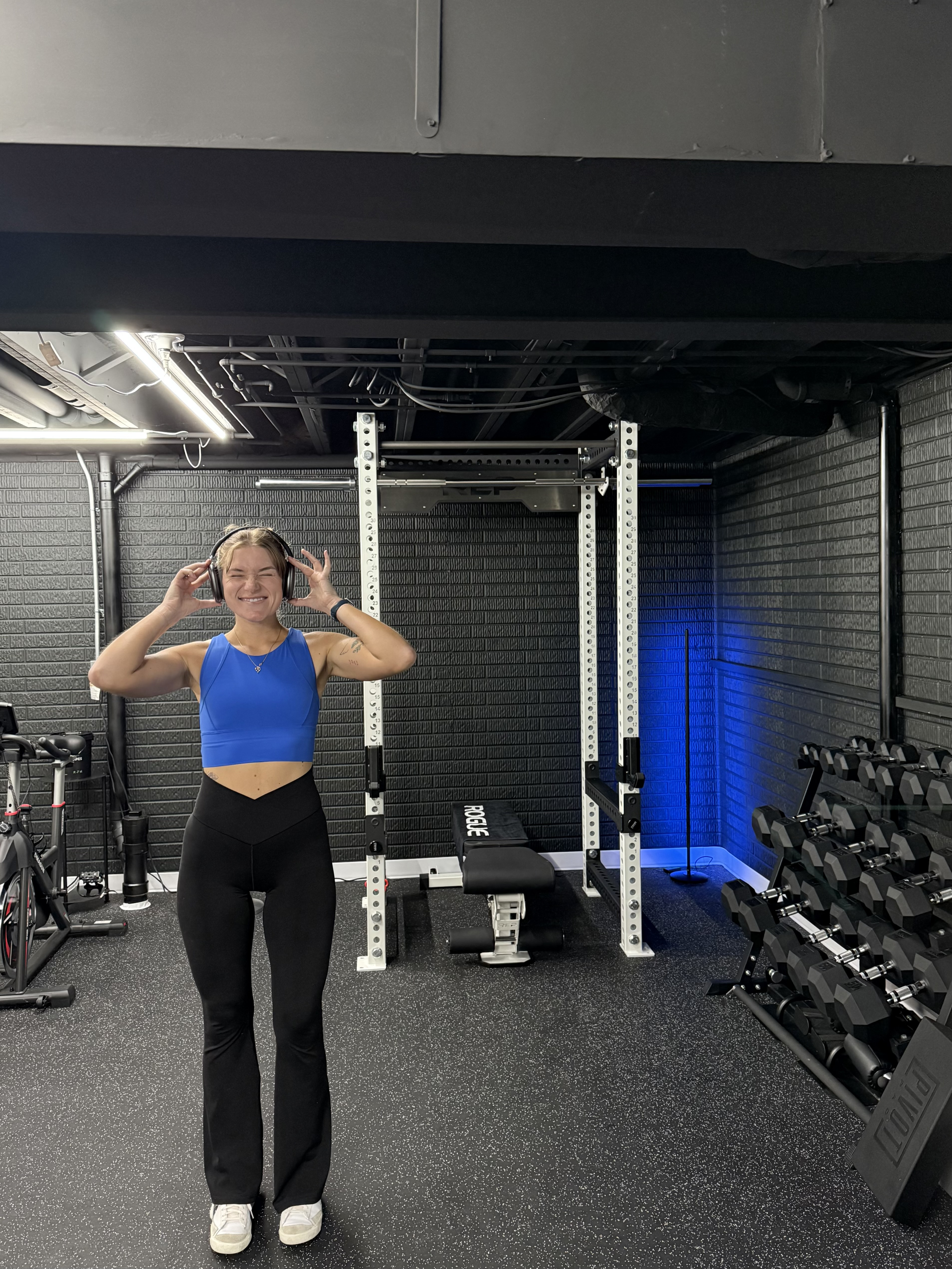 eeek. im so excited with how my home gym is coming along!!
*comfy blue gym fit
*amazon racerback sports bra, aerie black crossover flare leggings, nike blazers, w/ apple airpods max.  

 #LTKActive #LTKHome #LTKStyleTip