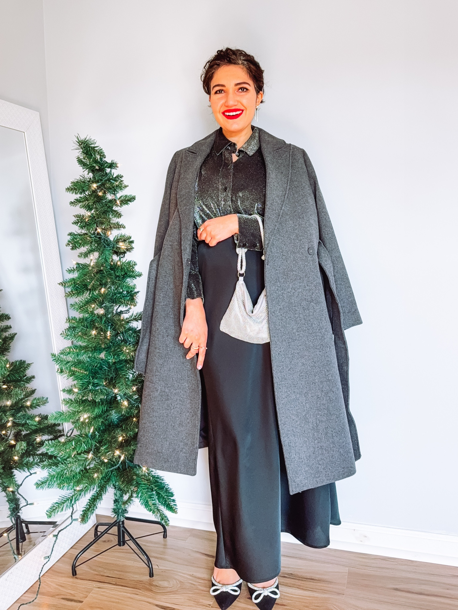 Holiday party outfit, grey coat, satin skirt, black skirt, slip skirt, sparkly shirt, glitter shirt, rhinestone clutch, evening clutch, bow pumps

#LTKHoliday #LTKGiftGuide