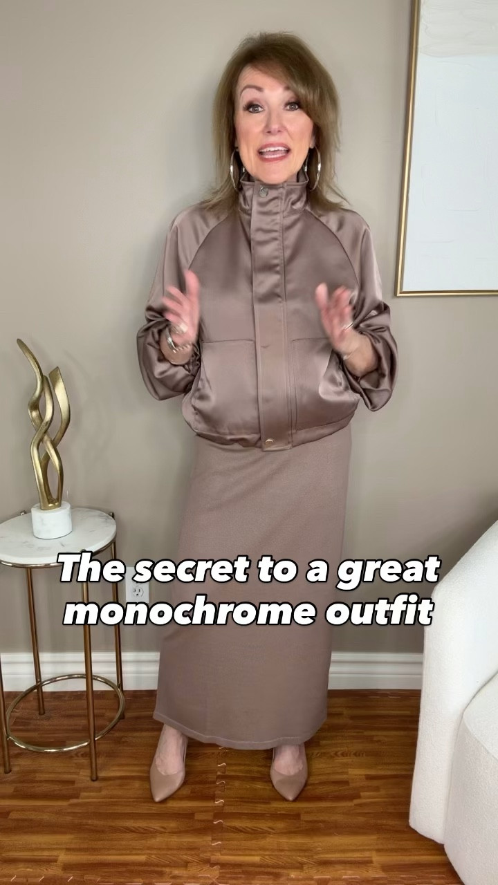 Neutral outfits sometimes get a reputation for being boring.

But one of the easiest styling tricks stylists use is monochrome dressing: wearing one color head to toe.

It instantly makes an outfit look more intentional and polished.

The secret is mixing textures so the look still has interest. In this case, a satin bomber paired with a soft jersey dress keeps the outfit from feeling flat.

Sometimes the simplest outfits are the most sophisticated.


#LTKOver40 #LTKWorkwear #LTKootd