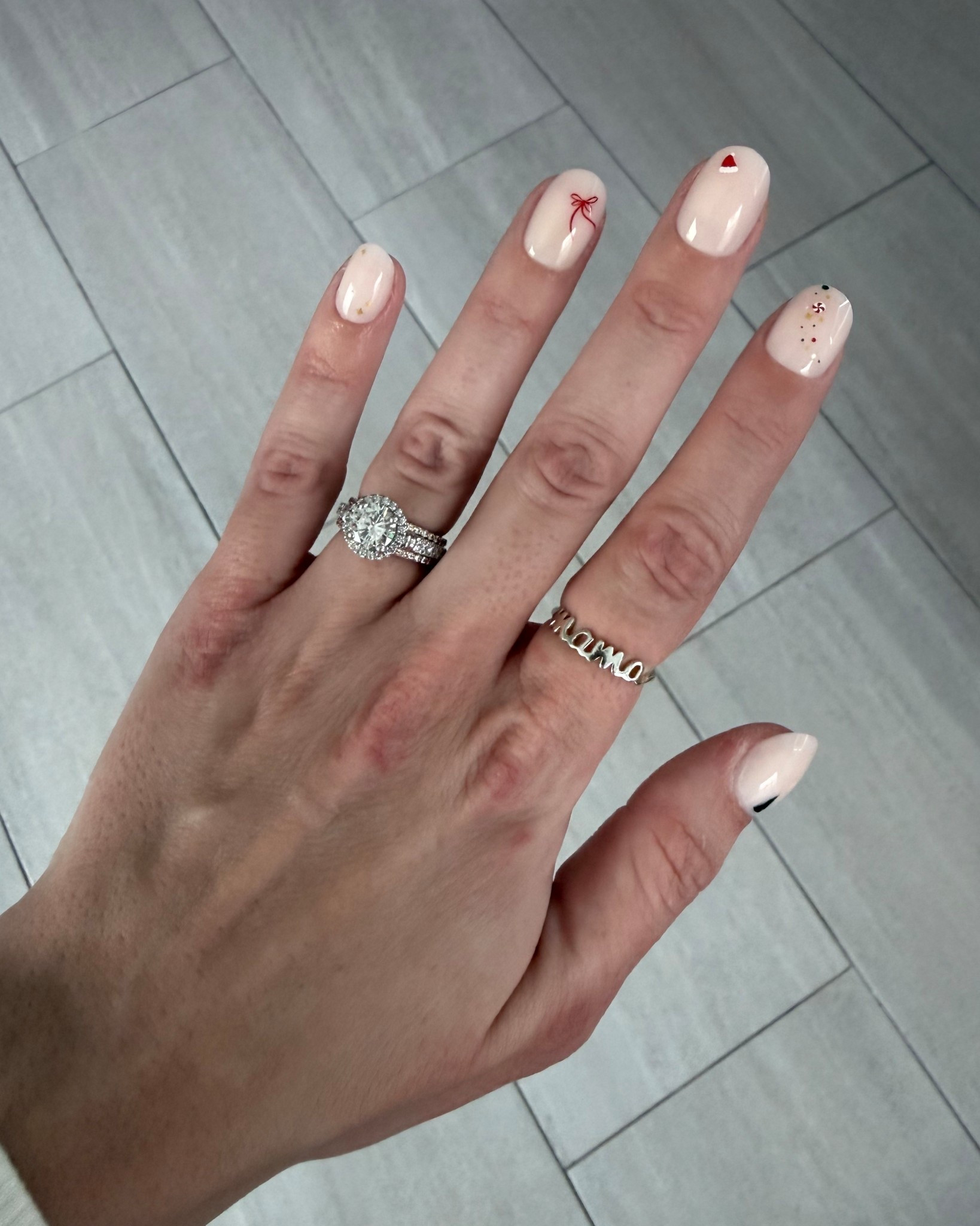 Subtle and fun holiday press on nails 💅 

#LTKBeauty #LTKselfcare #LTKHoliday