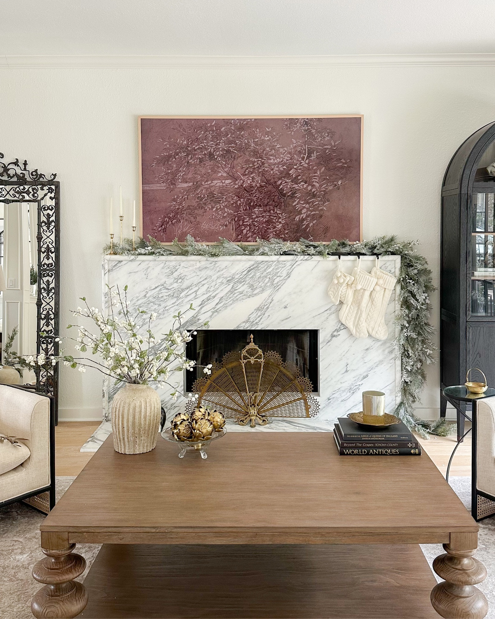 Holiday mantle garland and living room Christmas decor!

#LTKhome #LTKHoliday #LTKfindsunder50