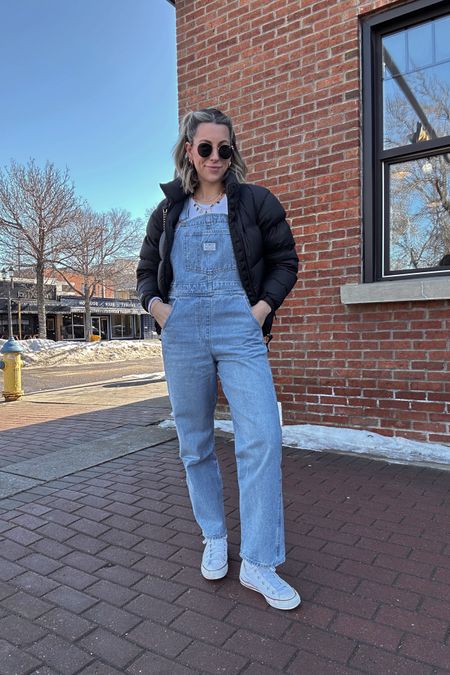 Spring ootd but make it warm 
North face puffer jacket size medium 
Levi’s overalls size medium 
Converse high tops fit tts 
Raybans 

#LTKstyletip