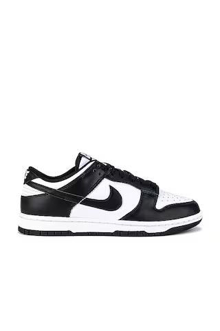 Nike Dunk Low Retro in White & Black from Revolve.com | Revolve Clothing (Global)