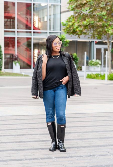 Find casual quilted coats like this one at Macys or splurge on the Burberry coat shown here. This easy outfit can be recreated with a black sweater, jeans, and Hunter boots.

#coat
#boots

#LTKSeasonal #LTKGiftGuide #LTKshoecrush