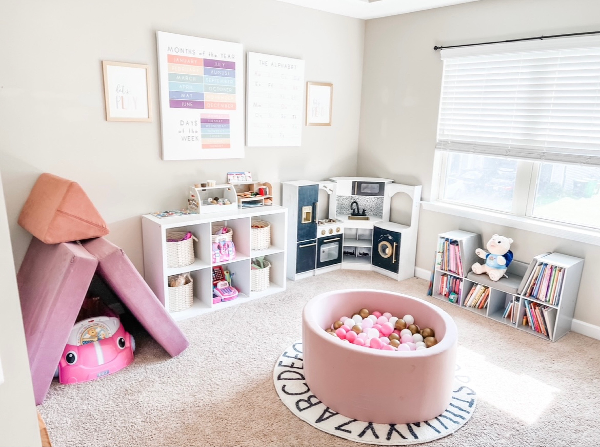 Obsessed with the Walmart kitchen! It was such a fun diy and love how it turned out! The girls are also obsessed with their ball pit and the added rug is just such a cute touch! 

#LTKhome #LTKbaby #LTKkids