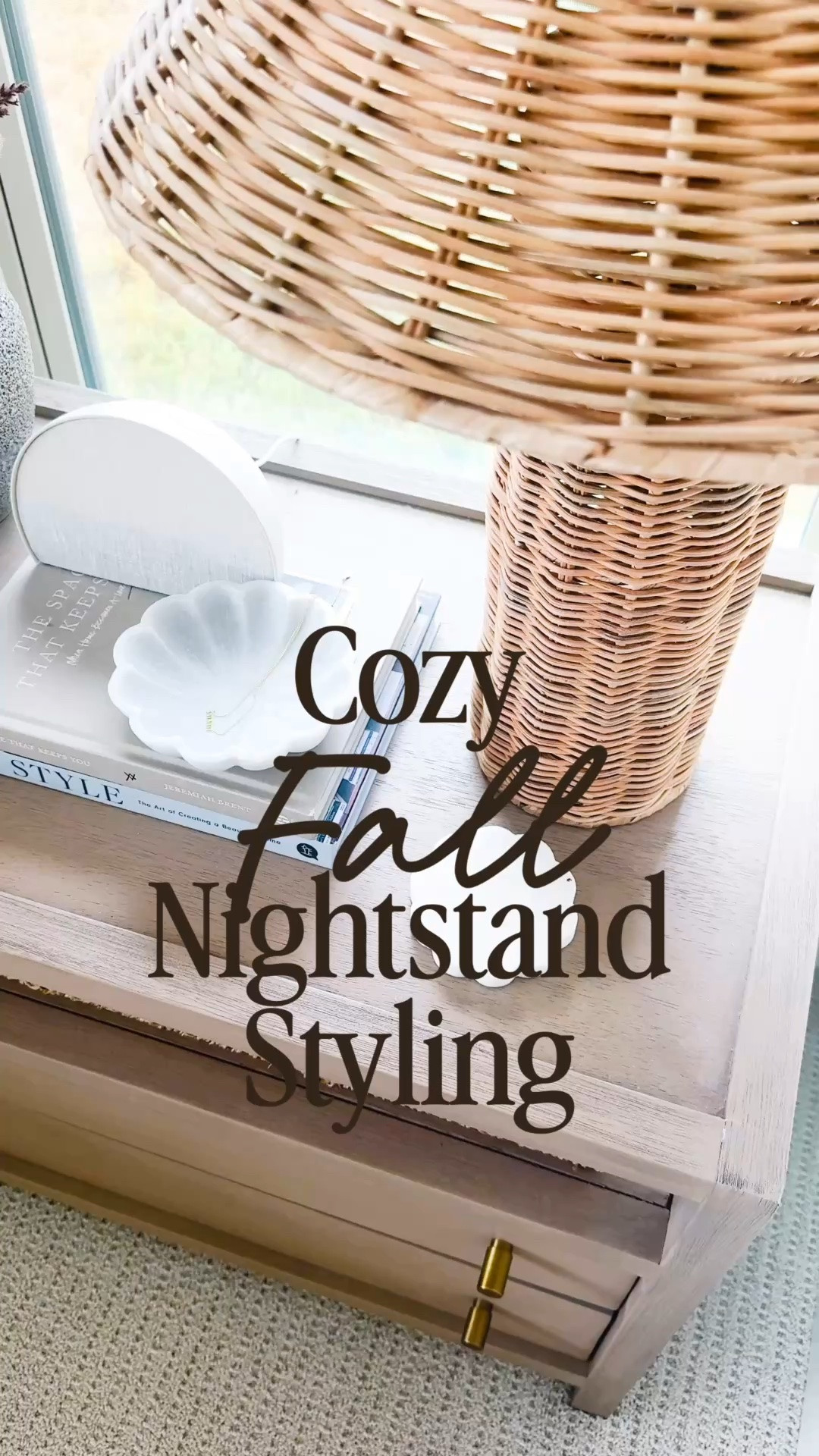 A cozy fall nightstand refresh with warm wood tones, woven textures and simple neutral decor that makes the whole bedroom feel a little more inviting. I love mixing an oversized wicker table lamp with stacked coffee table books, a decorative tray, textured vase and a few small fall accents for an easy nightstand styling idea that feels collected without looking cluttered. If you love neutral bedroom decor, organic modern bedroom ideas, cozy fall bedroom decor, bedside table styling, neutral fall decor and warm minimalist home decor, I linked the nightstand, lamp and similar decor pieces so you can recreate the look.

#LTKHome #LTKSaleAlert #LTKSeasonal