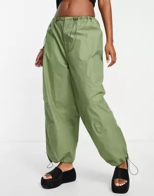 COLLUSION Unisex parachute pants in green | ASOS (Global)