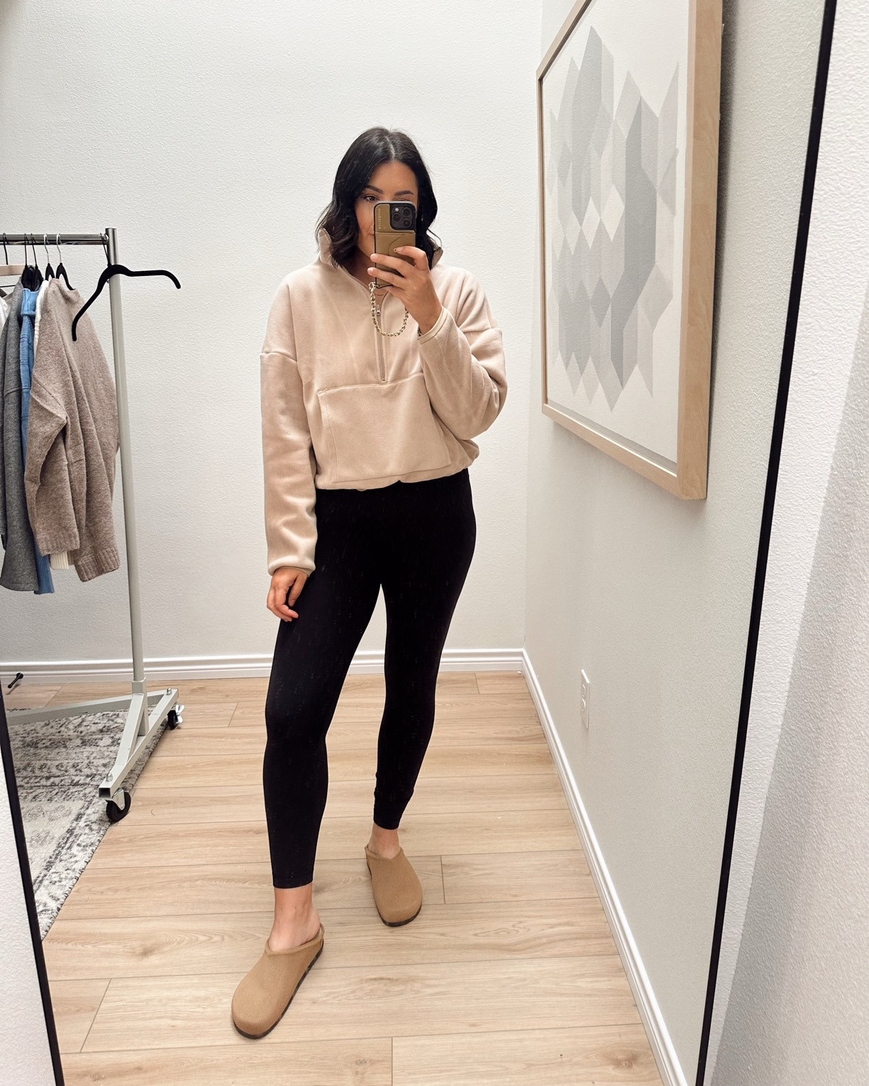 I'm in the large of the top -- it runs big!! No need to size up. 

I'm in the 8 of the leggings. The Clogs run TTS. 

 