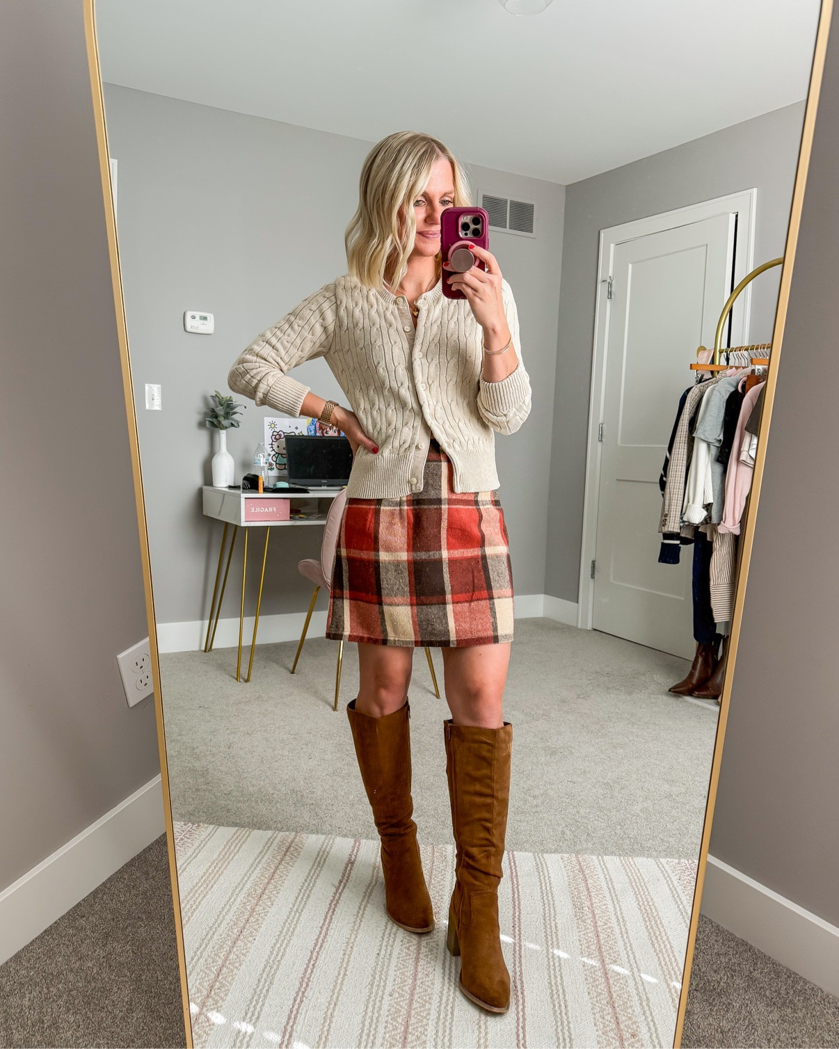 Plaid skirt styled with tall boots for fall 🍂 #LTKOver40 #LTKPetite #LTKSeasonal