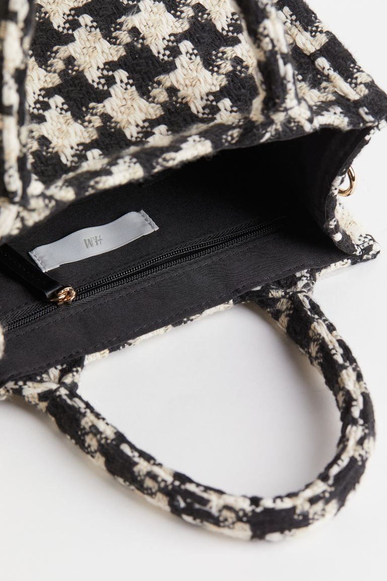 Small handbag in woven fabric with two handles, a detachable, adjustable shoulder strap, and an i... | H&M (US + CA)