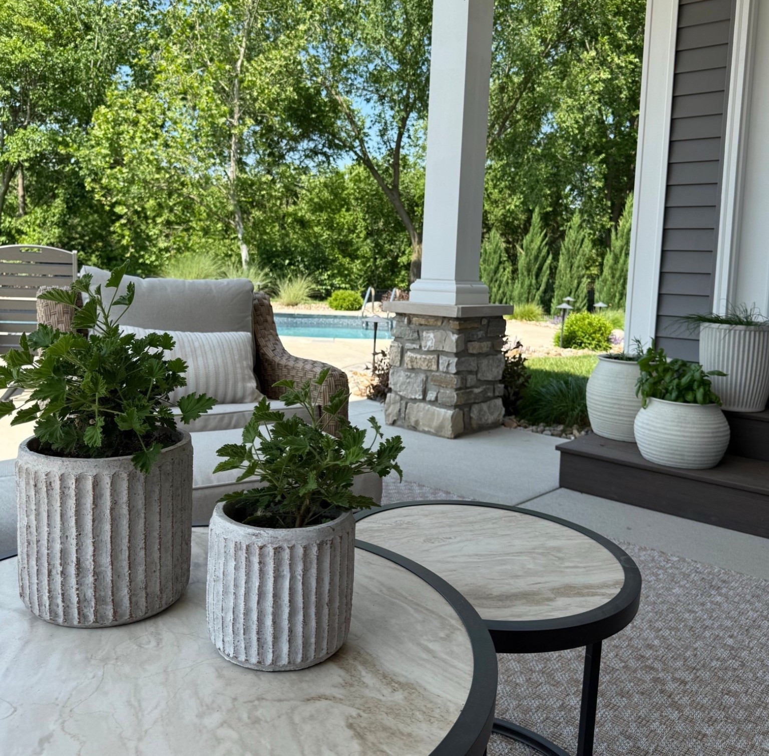 Neutral planters and outdoor seating  for your patio, porch and yard. 

#LTKHome #LTKSeasonal