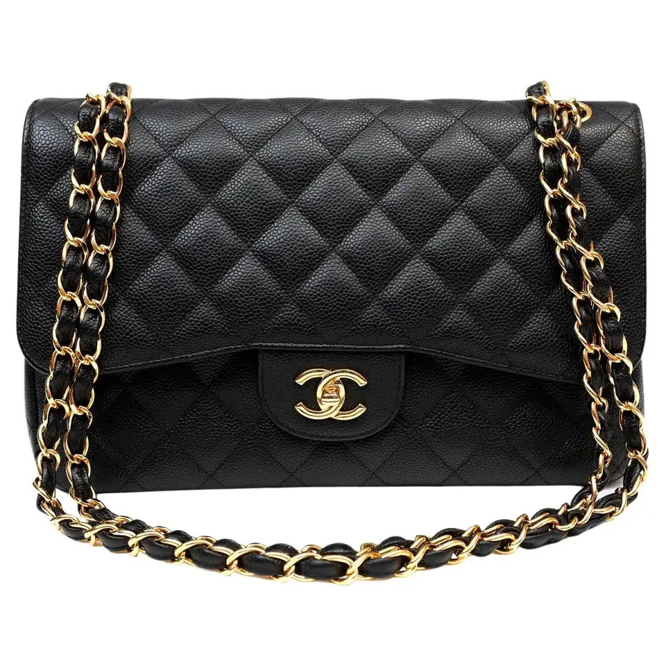 Chanel Black Caviar Jumbo Classic Flap with Gold Hardware | 1stDibs