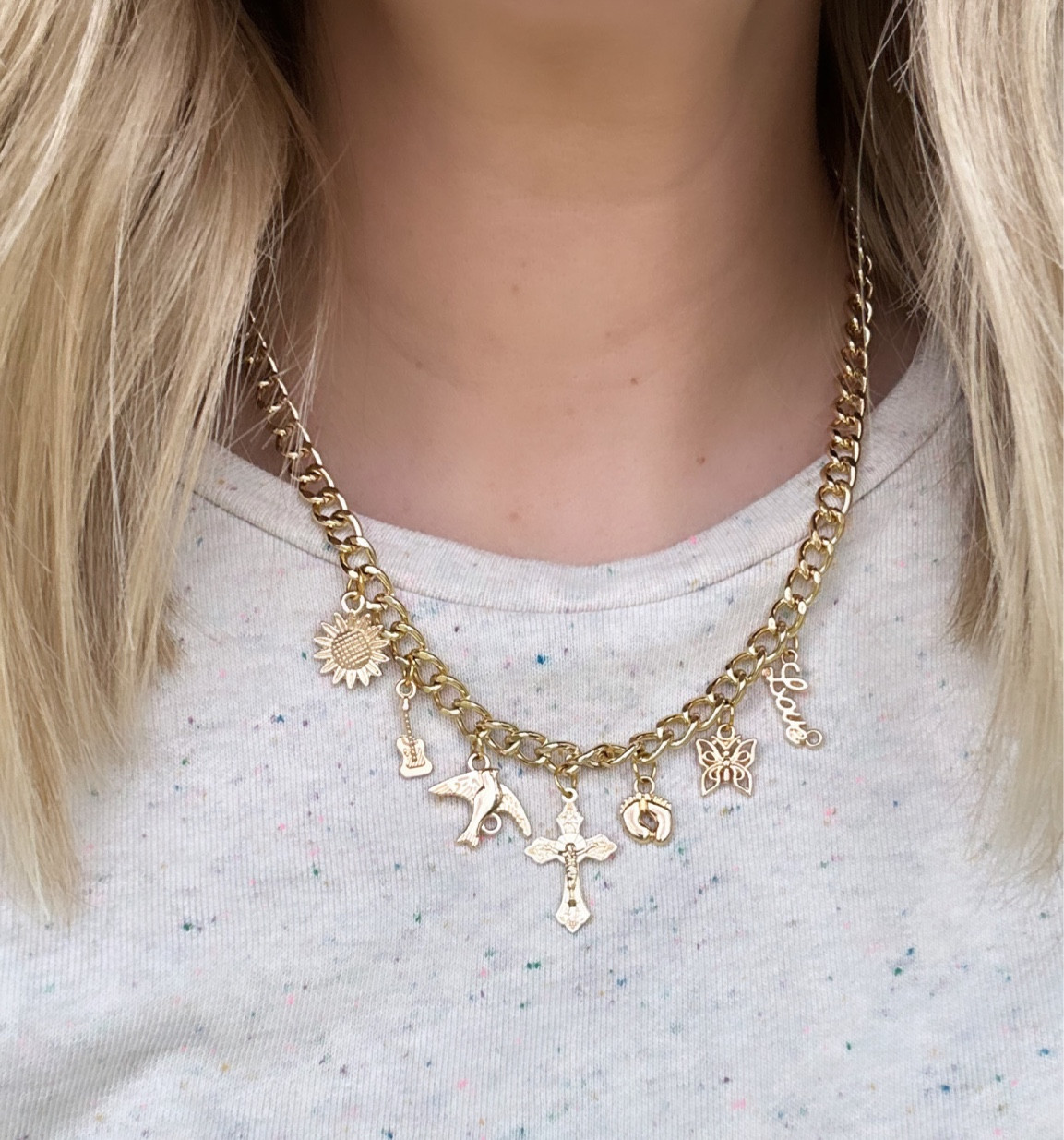 DIY charm necklace! I used Amazon charms and the 36in chain from Michael’s and made 2 necklaces with it! Linking Amazon chains as well. 

Amazon charm necklace for 
