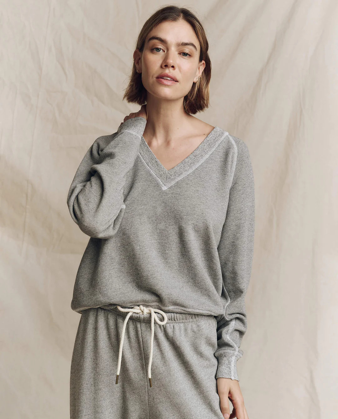 The V-Neck Sweatshirt. -- Washed White | THE GREAT.