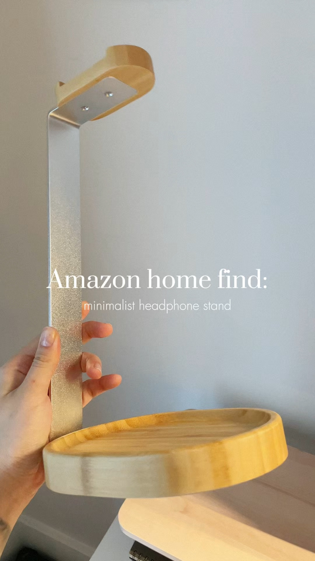 A sturdy and simple metal & wood minimalist headphone stand is what I needed to declutter the work desk. I like how there’s a tray at the bottom to put small items that I hate leaving around the desk. It’s like its own designated spot for those small things you don’t know where to put but needs to be close by. #homeoffice #organization #workdesk #deskorganization #amazonfind 

#LTKHome #LTKWatchNow #LTKFindsUnder50