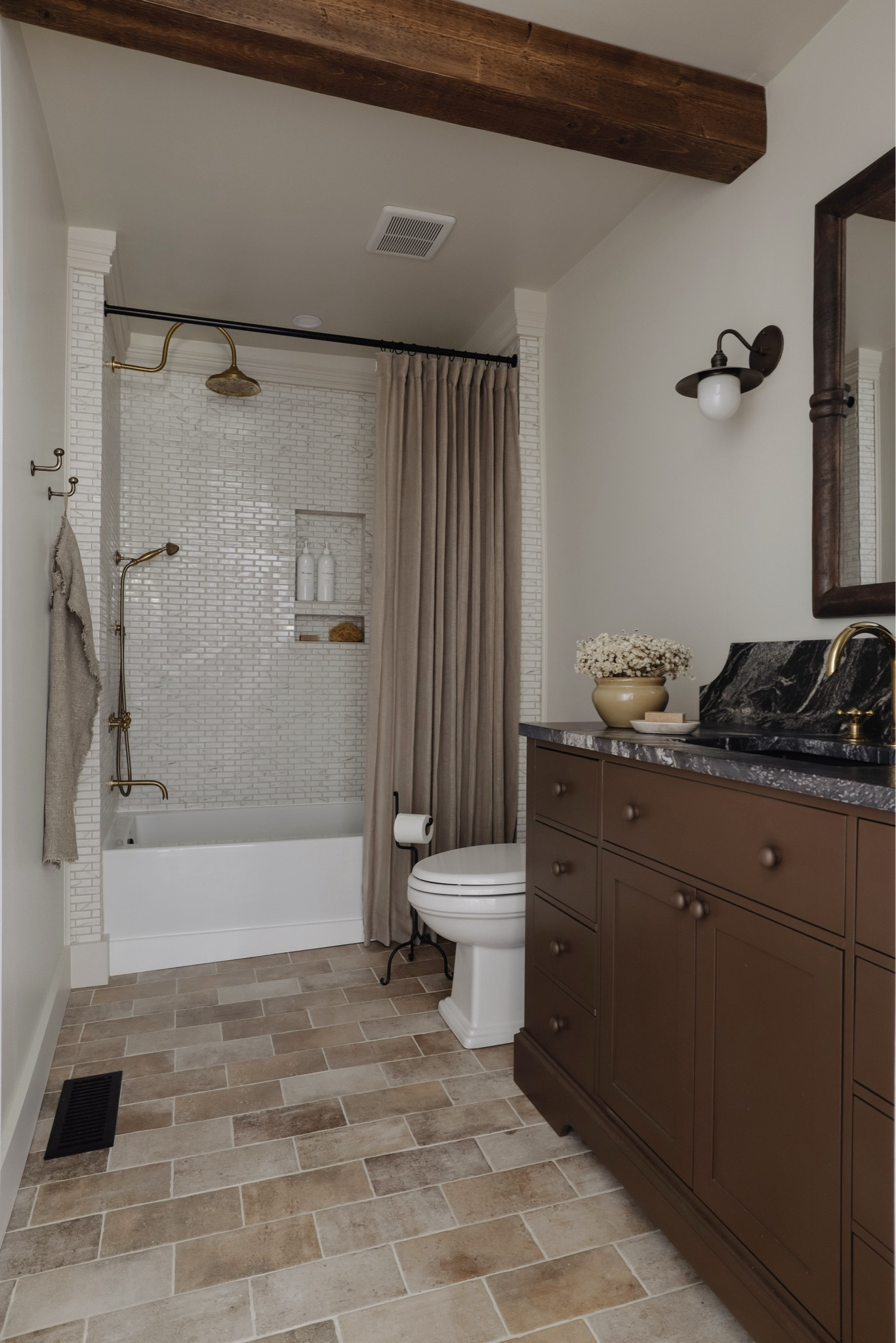 Links to everything in our bathroom!

Brown vanity // unlacquered brass faucet // unlacquered brass shower head // antique brass sconce 

#LTKHome