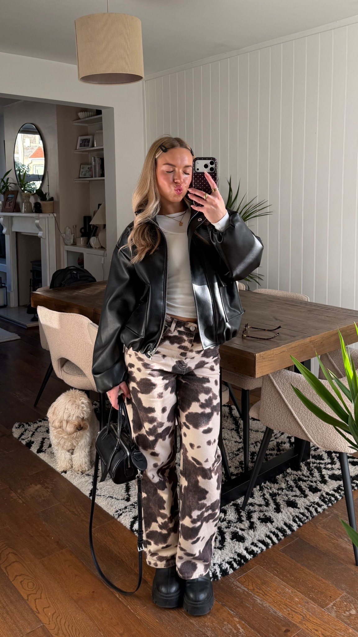 Yeehaw 🤠🤎 

New Look
Layered top
Cowprint jeans 
Funnel neck leather jacket 
Mini bowling bag 

#LTKspring #LTKstyletip #LTKjeans