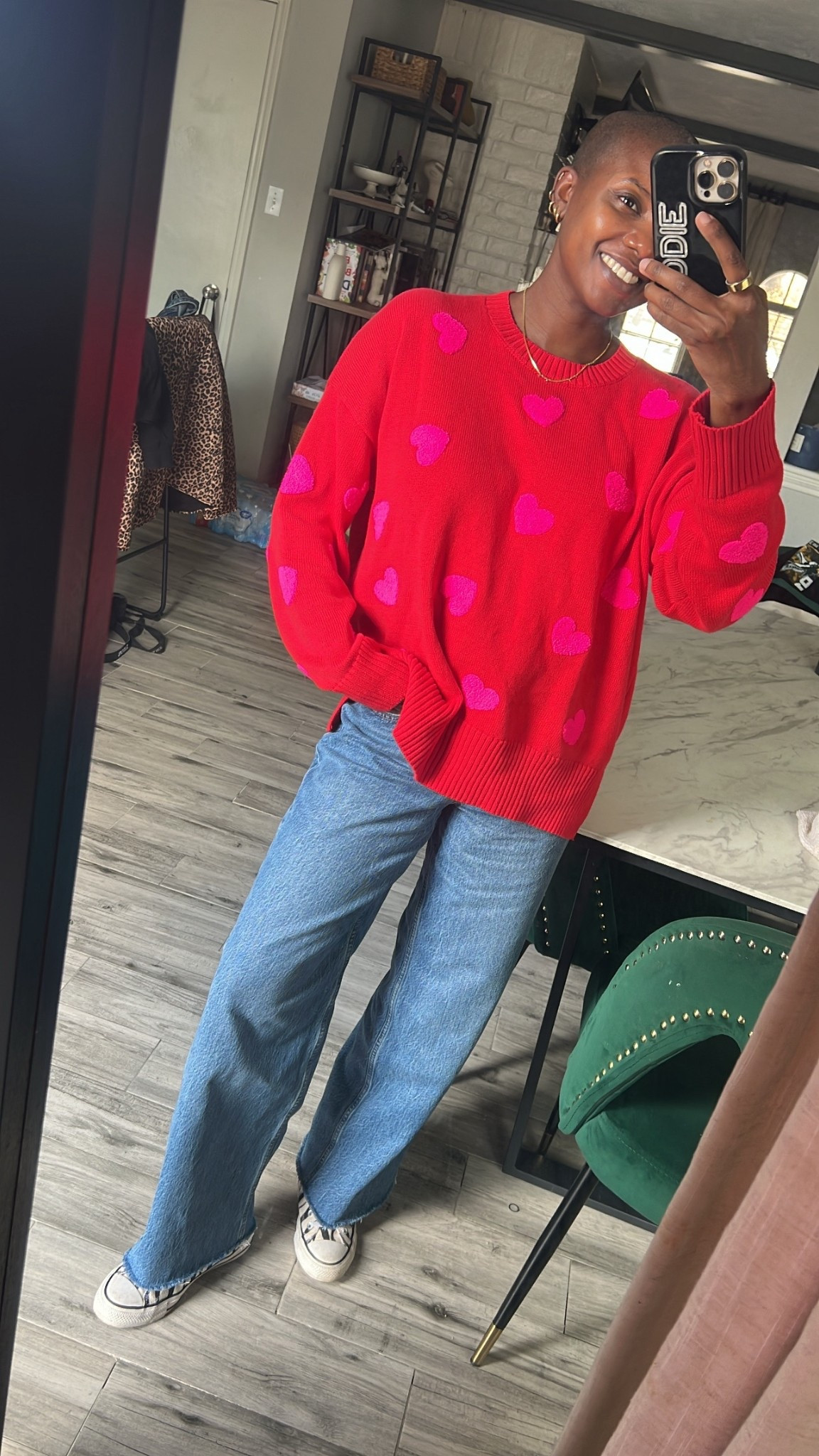 Valentine’s Day sweater! Red sweater with pink hearts paired with wide leg denim jeans  

#LTKValentine #LTKWorkwear