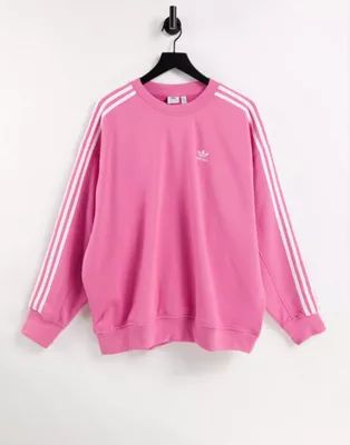 adidas Originals adicolor three stripe oversized sweatshirt in pink | ASOS (Global)