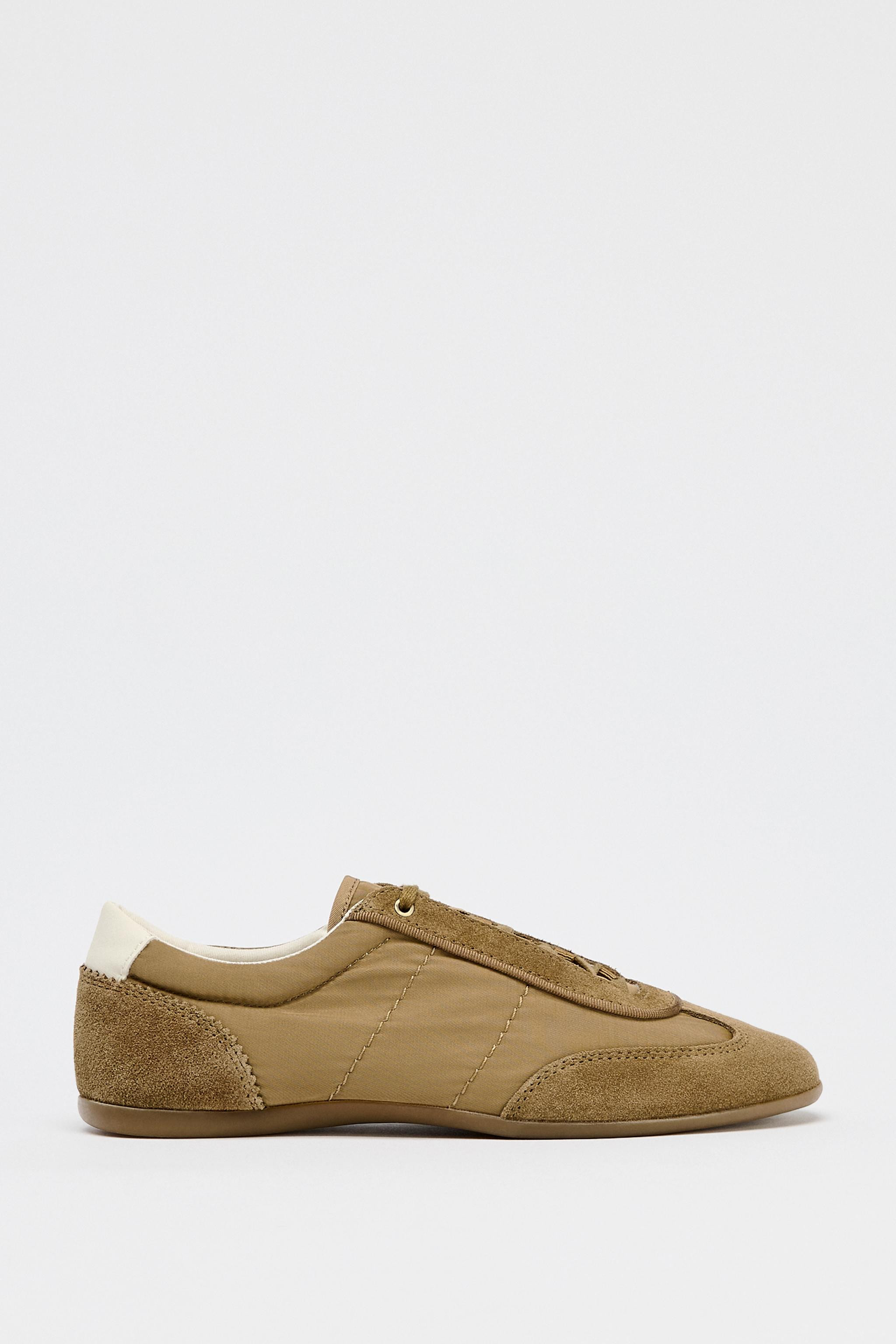 Soft style sneakers. Combination upper. Contrasting back. Topstitching detail. Lace closure.Sole ... | Zara US