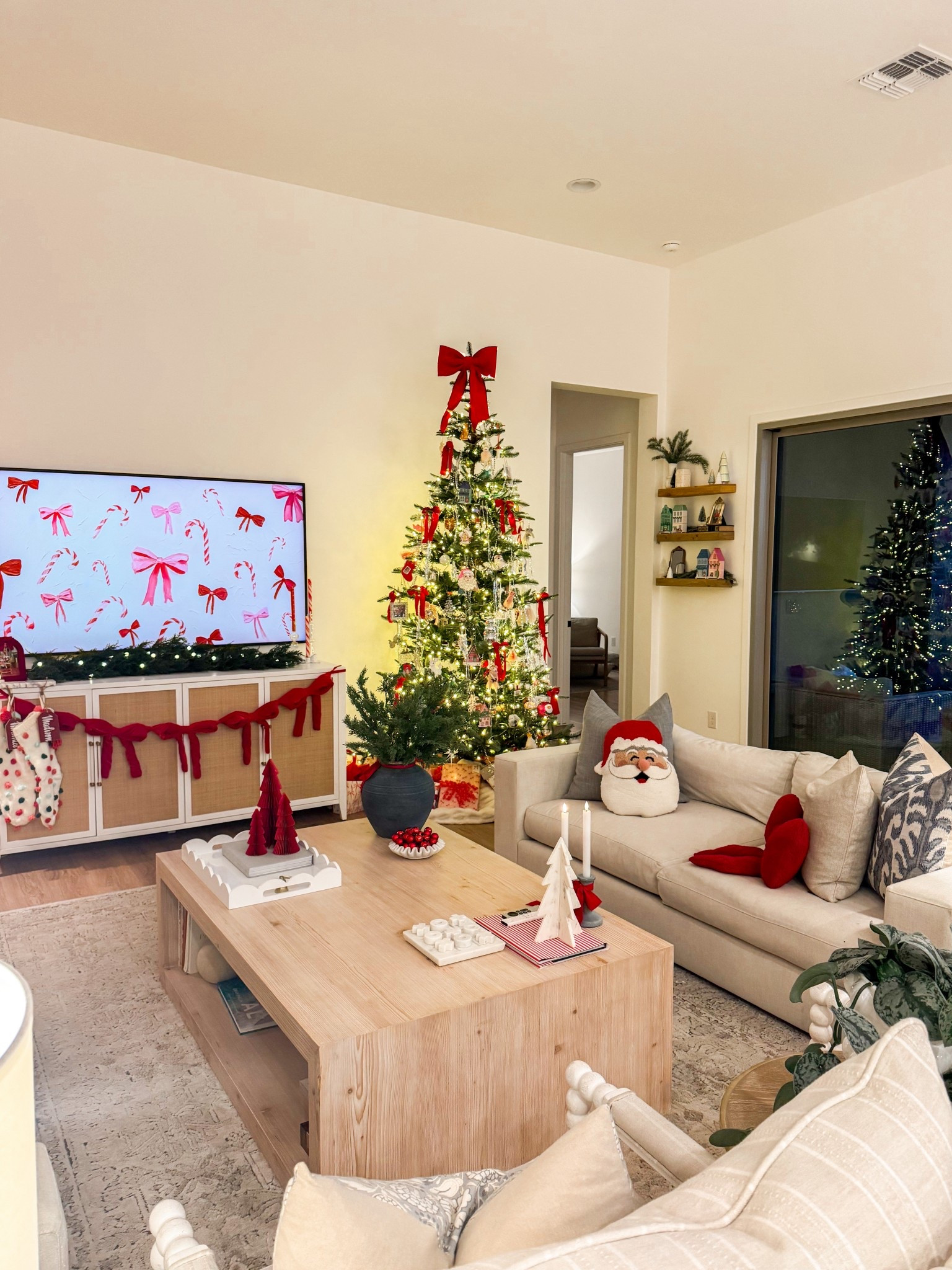 Christmas views from last year. Still working on final touches for this year! Christmas decor, Christmas decorating, red ribbon, bows, Christmas tree 

#LTKHome #LTKHoliday