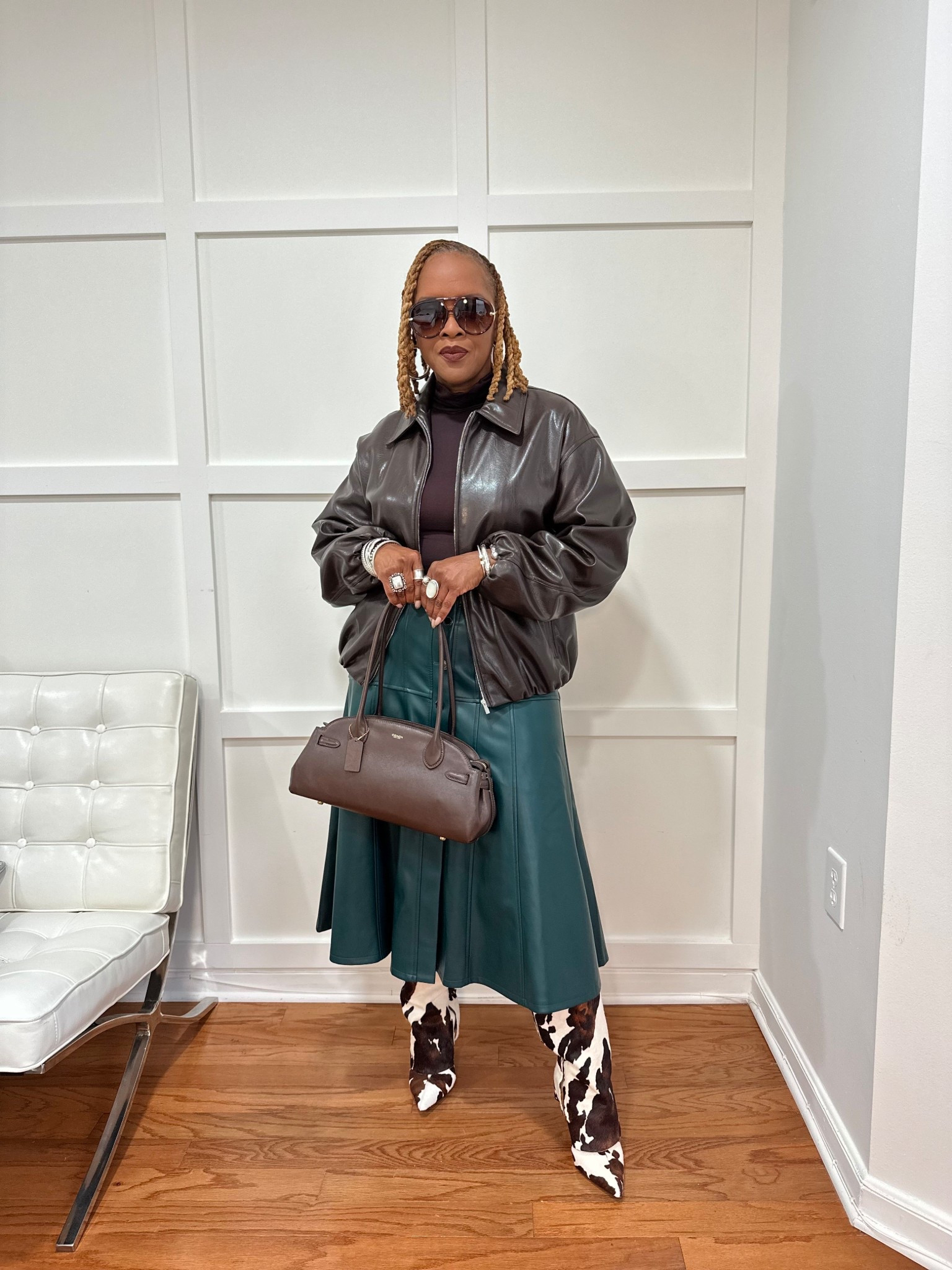 Weekend casual chic outfit 
Macy’s Cow print boots
Zara Bomber Brown Faux Leather Jacket
Brown Coach Bag
Lip Bar in Savage

#LTKShoeCrush #LTKItBag #LTKOver40