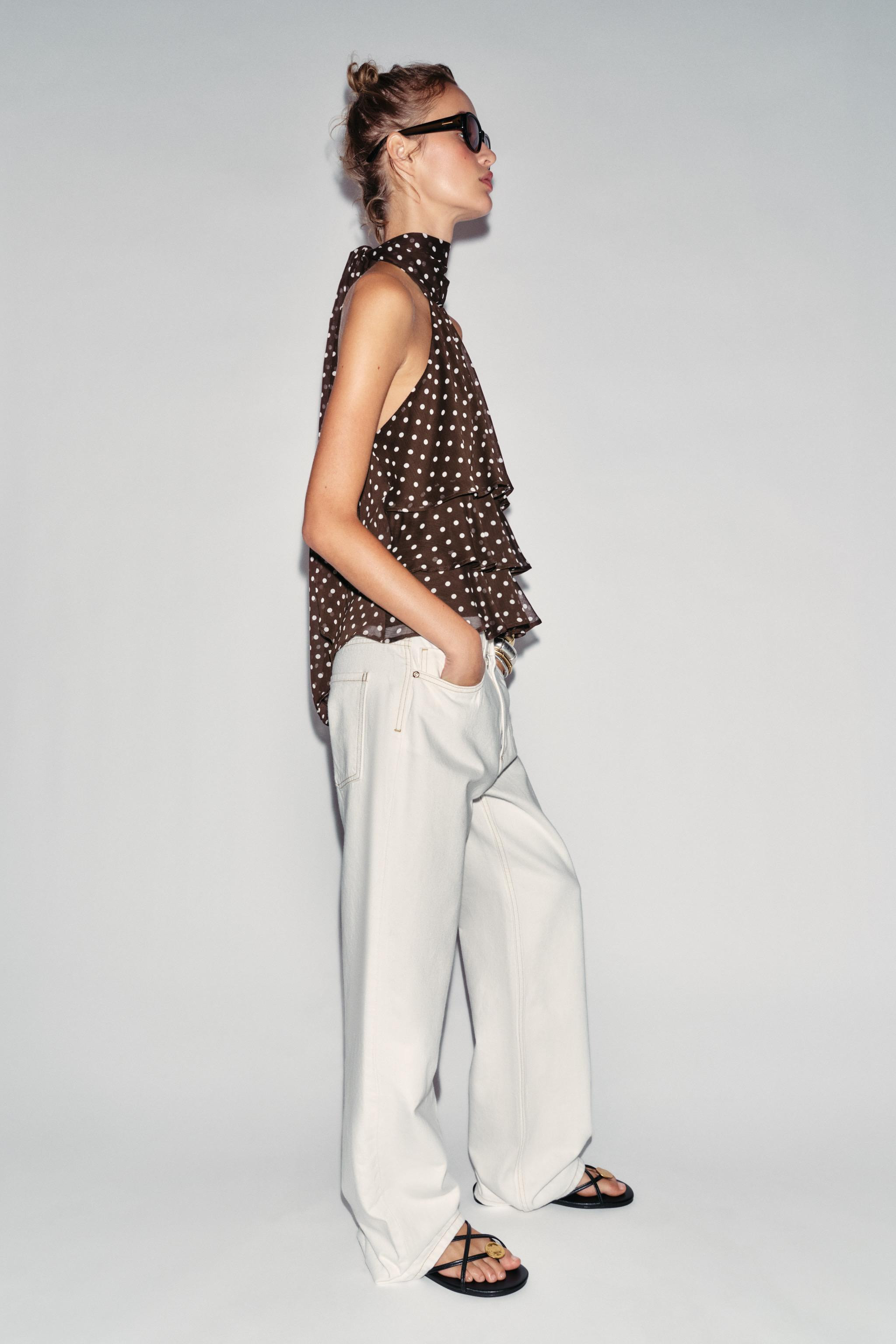 Halter neck top with ruffles and open back. Featuring hidden button fastening at the back. | Zara UK