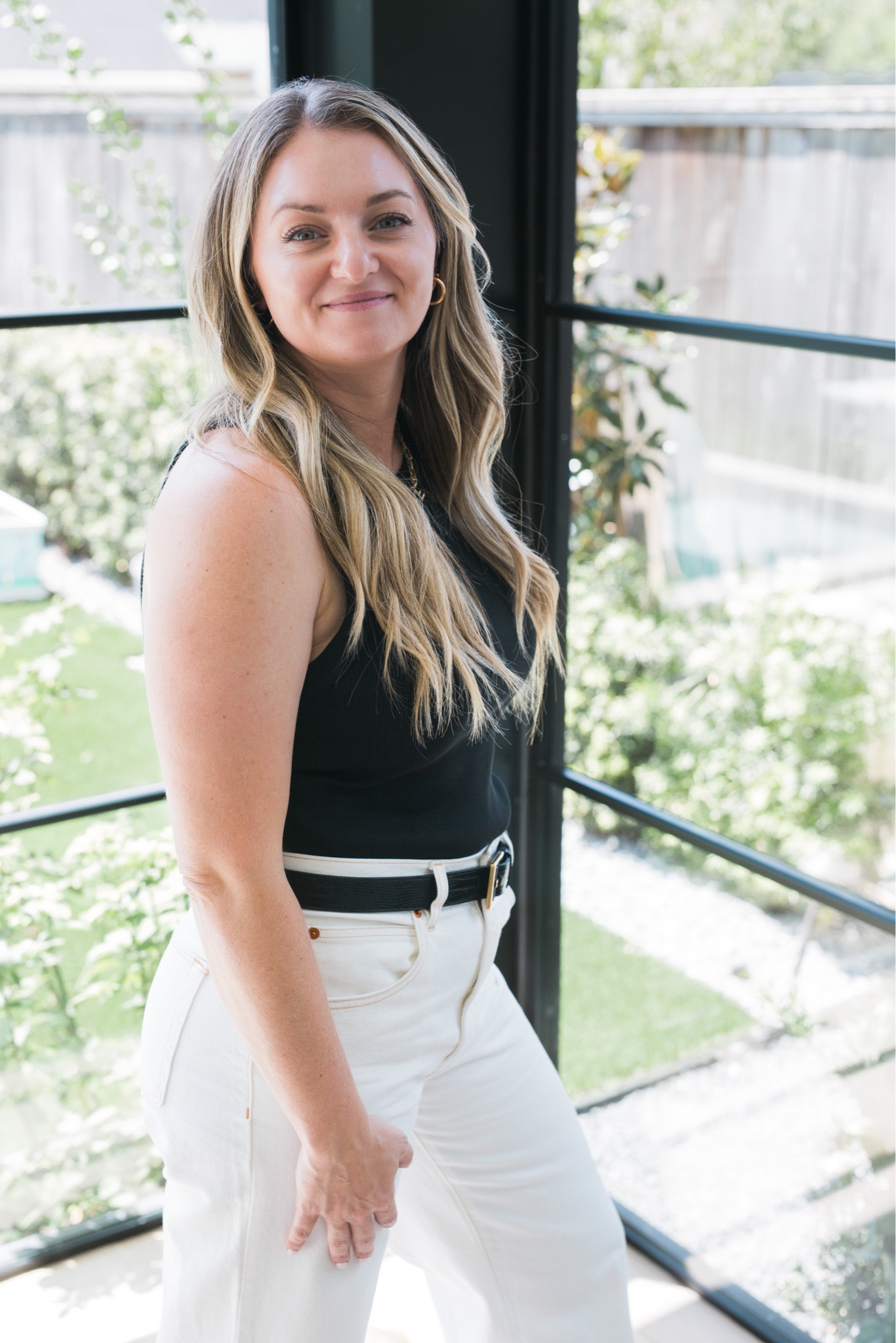 Keeping the tank theme going I’ve swapped my casual white cargos for more tailored white wide legged jeans, added a belt and black tank! Perfect for date night  