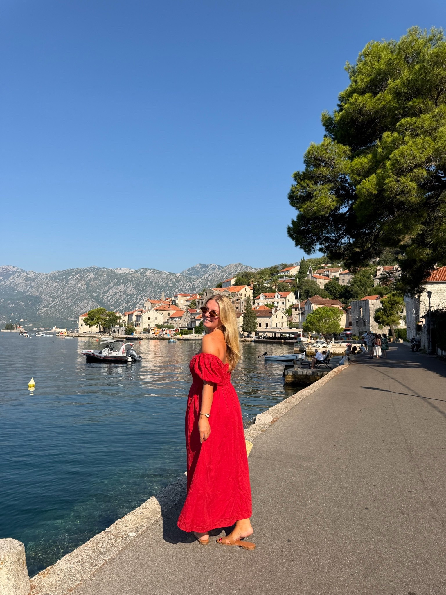 Strolling through charming little town Perast in the prettiest red dress  ❤️ Easy, flowy and made for European summer days by the water ✨🌊

#LTKootd #LTKSaleAlert #LTKTravel
