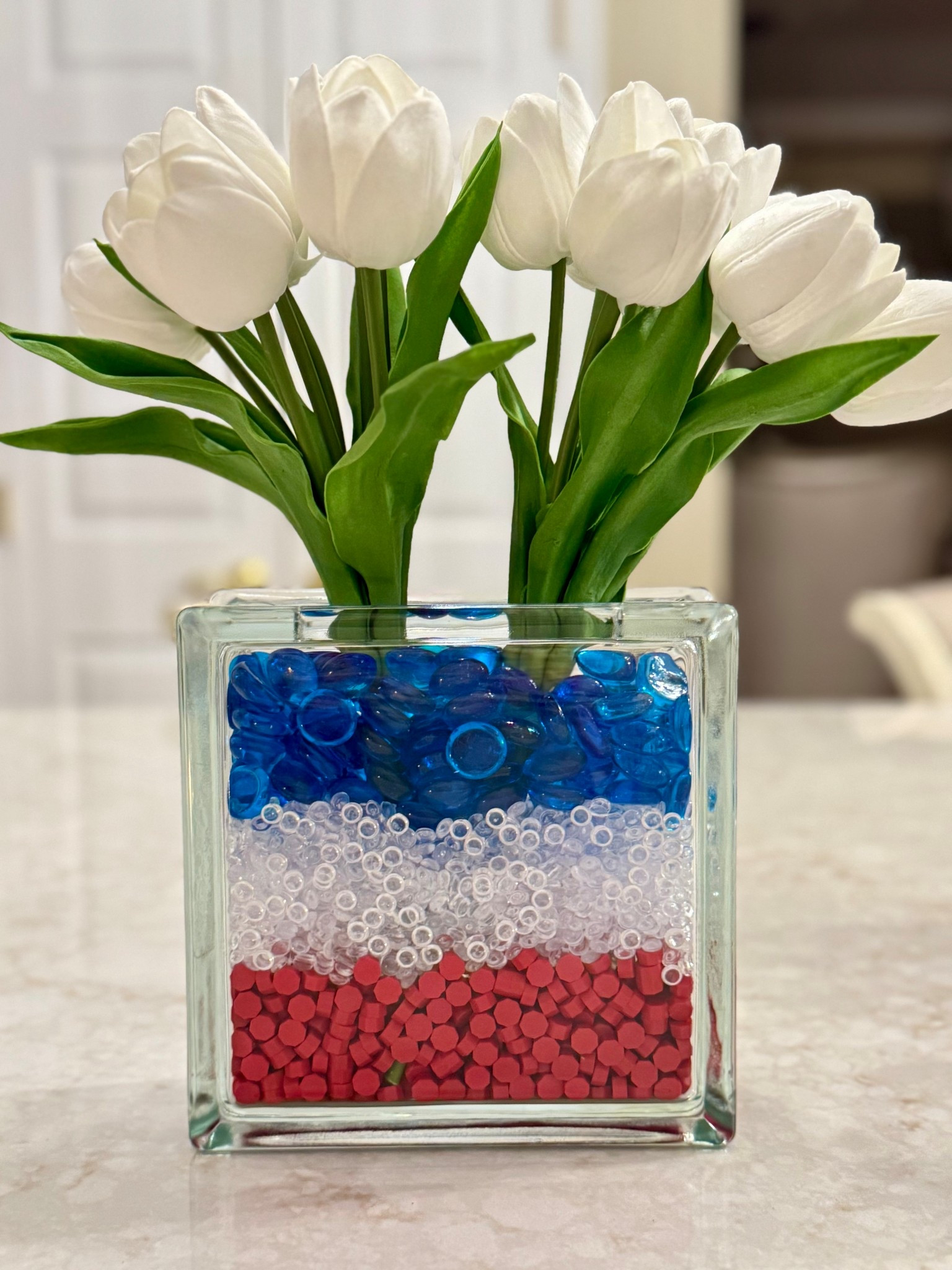 Stars, stripes, and tulip delight! 🌷🇺🇸 This DIY patriotic floral display adds a pop of red, white, and blue to your summer table—perfect for the 4th of July, Memorial Day, or any festive celebration. Simple to make, stunning to display!

#PatrioticDecor #FourthOfJulyDIY #RedWhiteAndBlue #TulipLove #DIYFloralArrangement #SummerCenterpiece #JustJennsDesign #HomeDecorInspo #MemorialDayVibes #LTKHome #HolidayVibes #CraftyAndCute #FloralInspo #DIYDecor #MadeWithLove

#LTKSeasonal #LTKHome