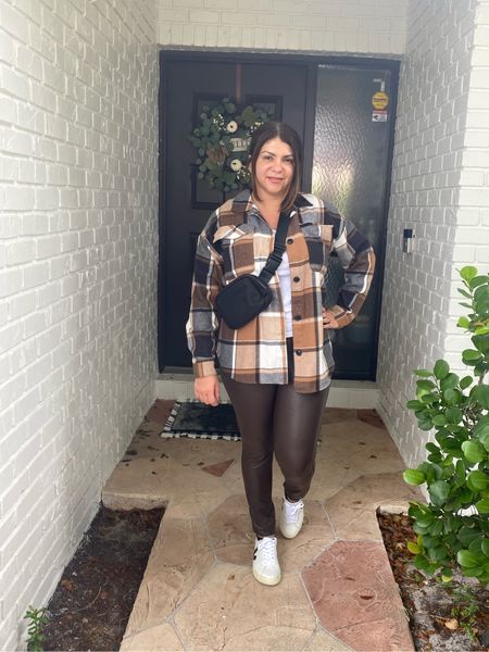The perfect fall outfit for travel! This shocker was a great find from Walmart and so we’re these fake leather leggings. Topped with my new favorite black Fanny pack and white veja shoes. 

#LTKSeasonal #LTKcurves #LTKtravel
