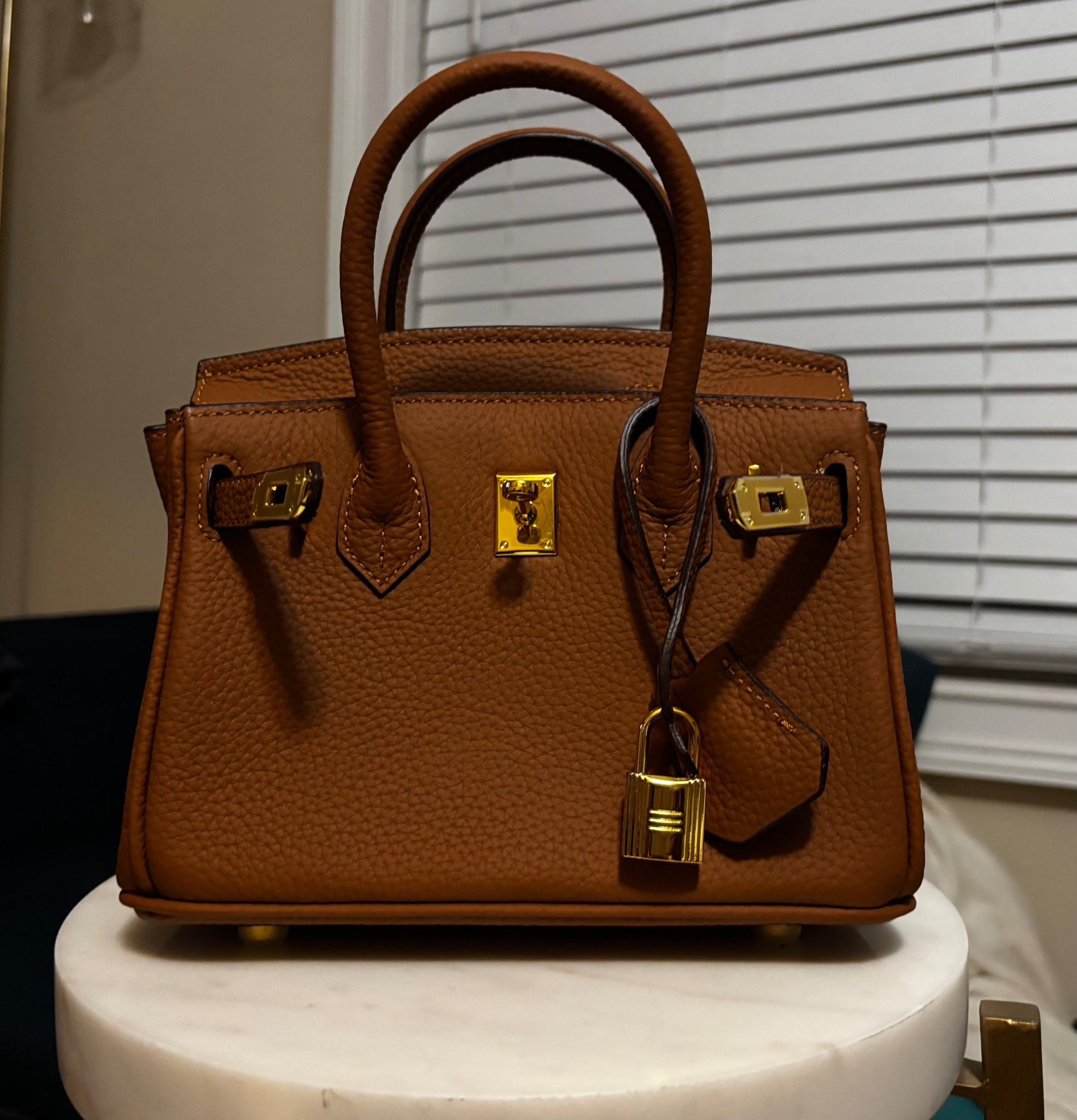 Birkin purse link!! I have the 20cm khaki (“gold” on gold).