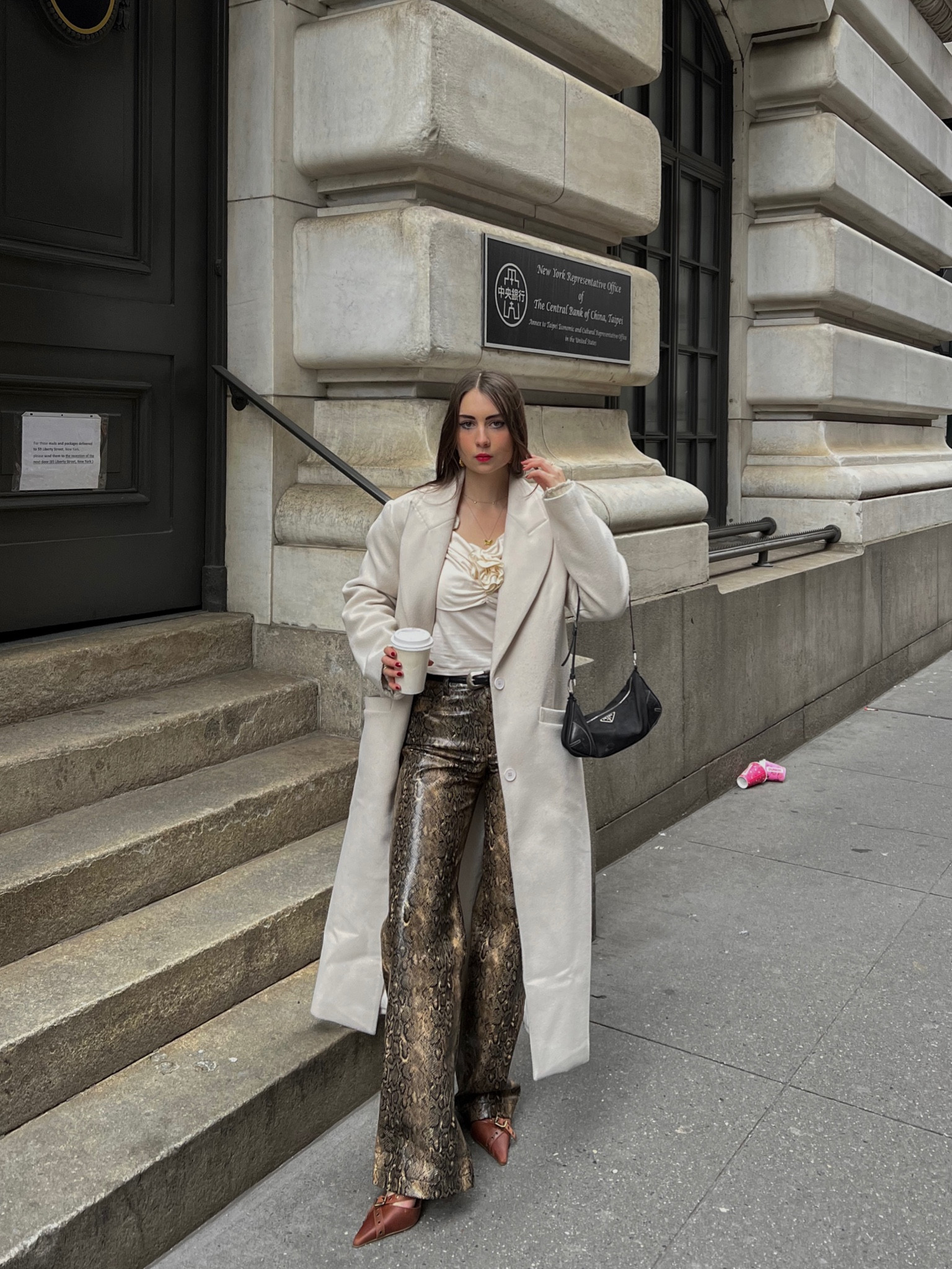 Chic winter outfit inspiration 
Snake print pants, leather pants, wool coat, winter coat, rose embellished top, neutral outfit, kitten heels, vintage Prada bag, street style inspo, classy streetwear, winter ootd, classy outfits, winter fashion, minimal style, street style 

#LTKstyletip #LTKworkwear #LTKsalealert