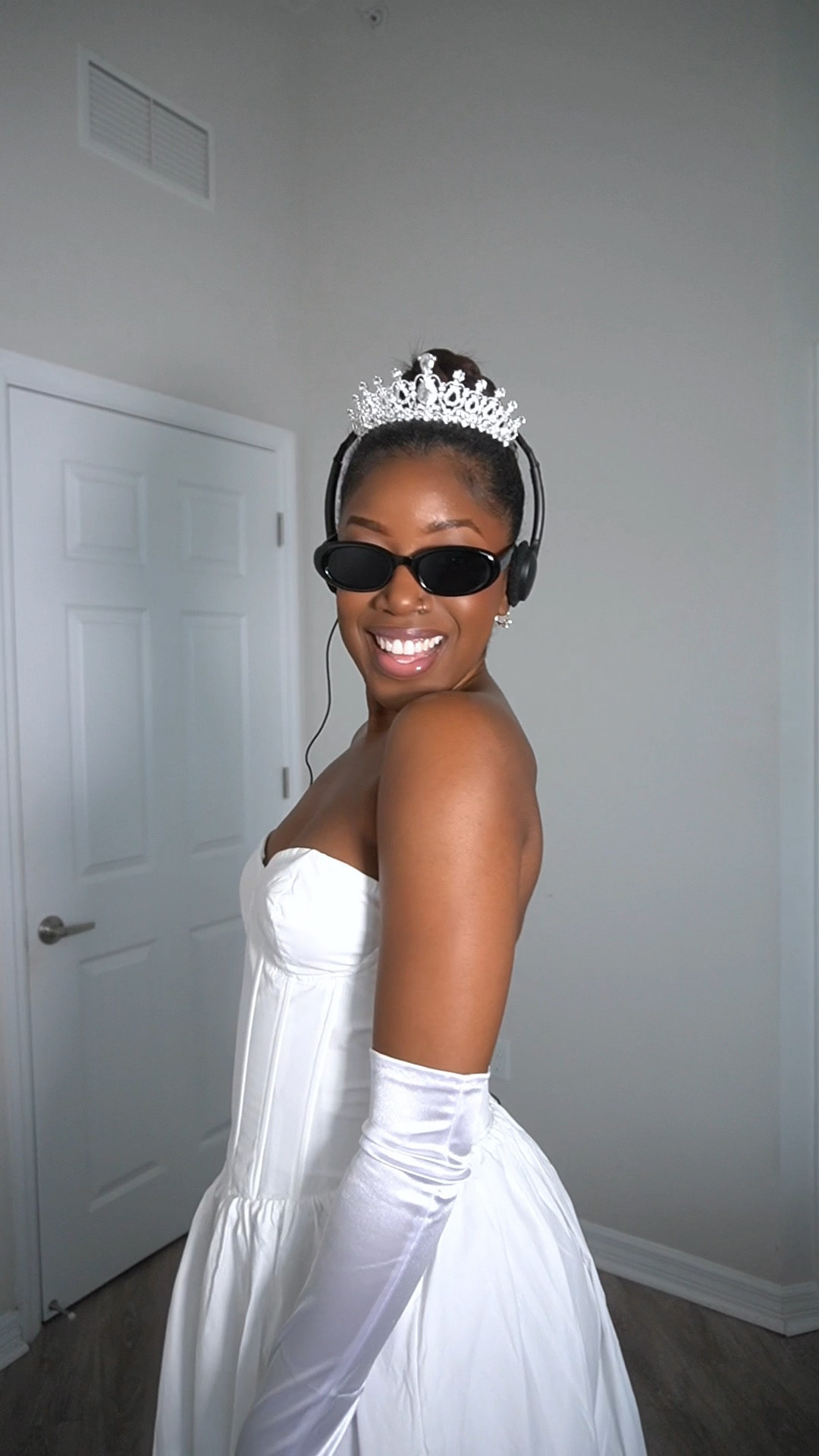 Princess Diaries Costume 
Halloween Costume idea 
Princess costume for Halloween 
Princess tiara 
White satin gloves 
White strapless dress 
Black sunglasses 
Black headphone set 
Disney movie costume 
Disney princess costume 

#LTKFindsUnder50 #LTKHalloween #LTKSeasonal