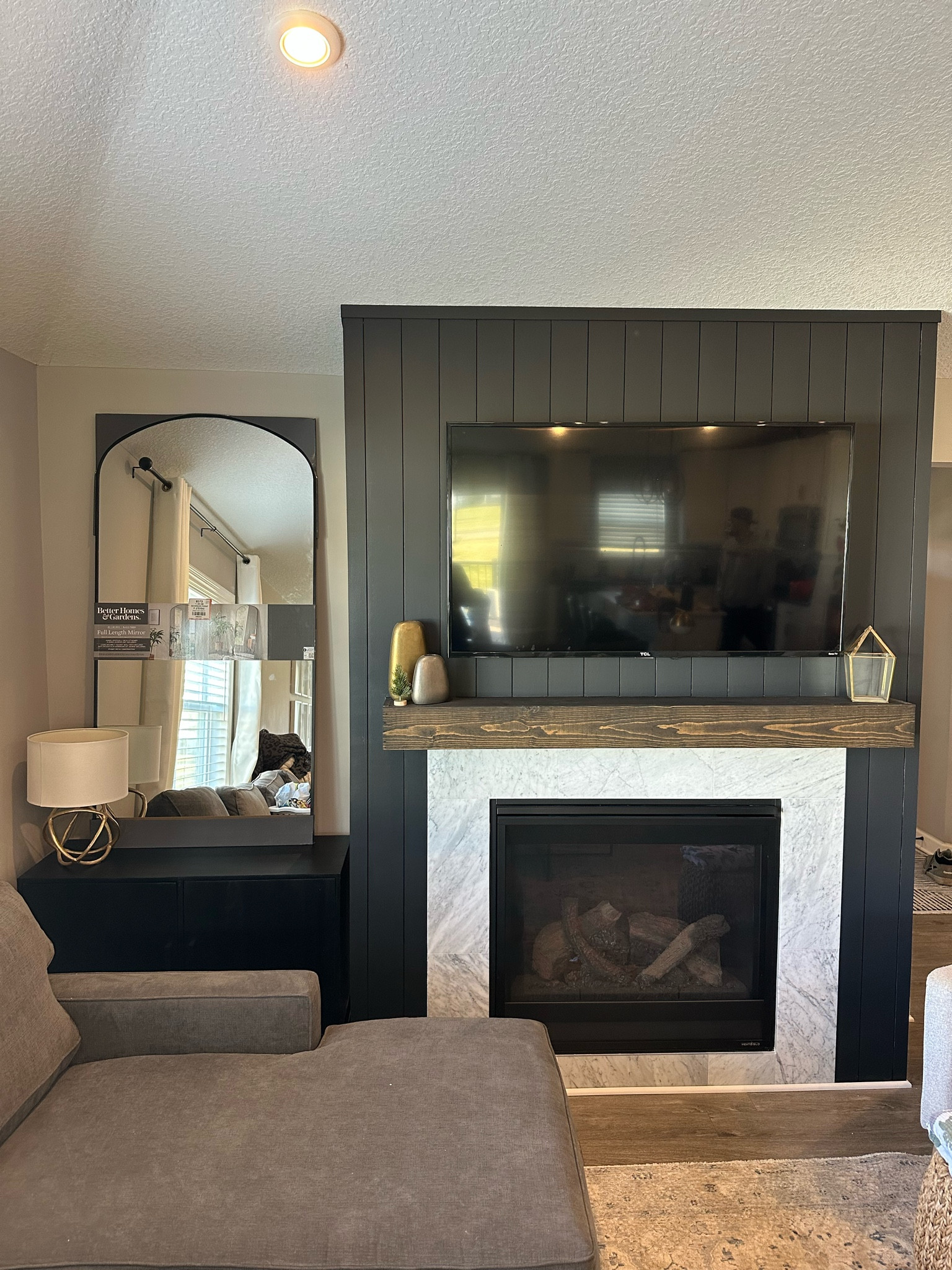 Picked up this black arched mirror today at Walmart - great price and great quality for under $100! This is the 60x30 which fit perfectly on top of our cabinet!

#LTKfindsunder100 #LTKhome #LTKHoliday