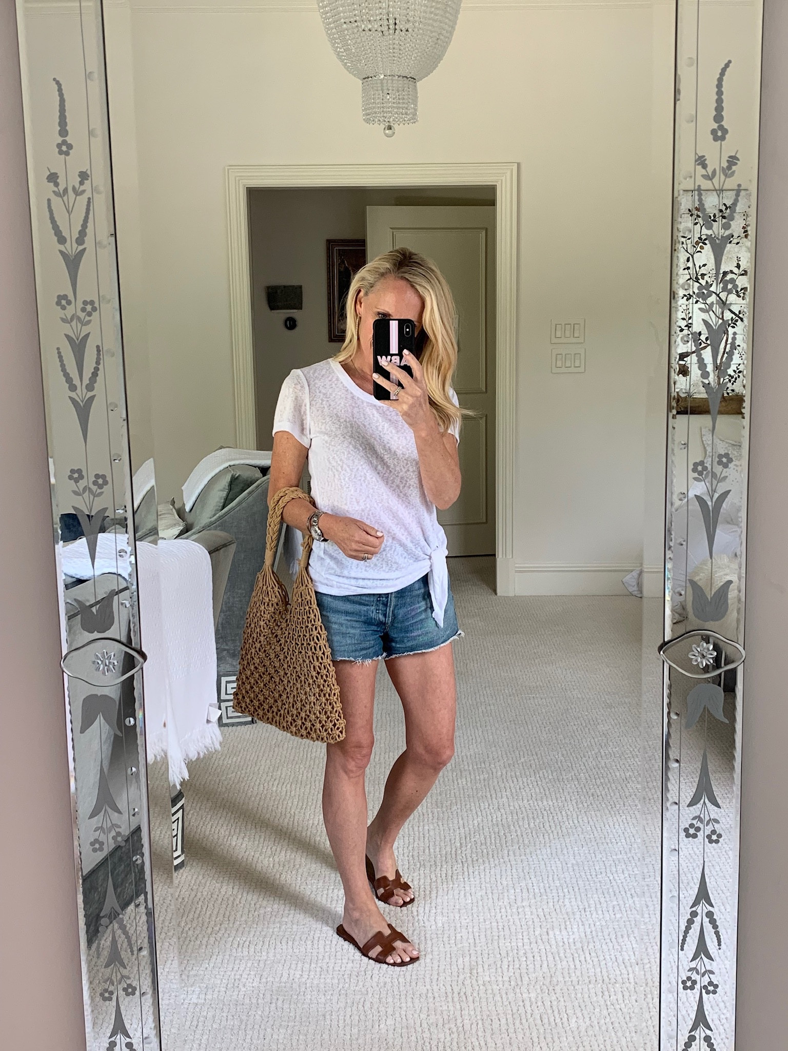 Simple, casual summer look! Perfect for covering up for a trip to the beach or pool, running errands or a casual outing! 

I’m wearing a basic white tshirt, denim shorts, my favorite brown leather sandals and a brown tote

#LTKstyletip #LTKSeasonal #LTKFind